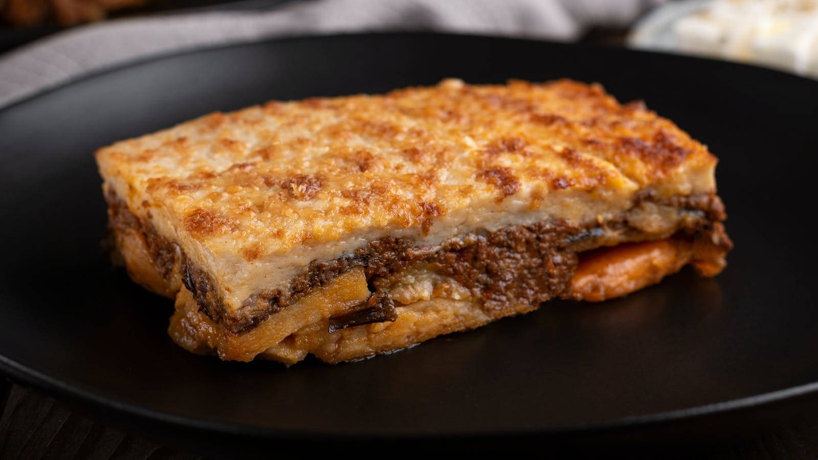baked moussaka, golden-brown layered casserole, melted cheese, HD Desktop Wallpaper