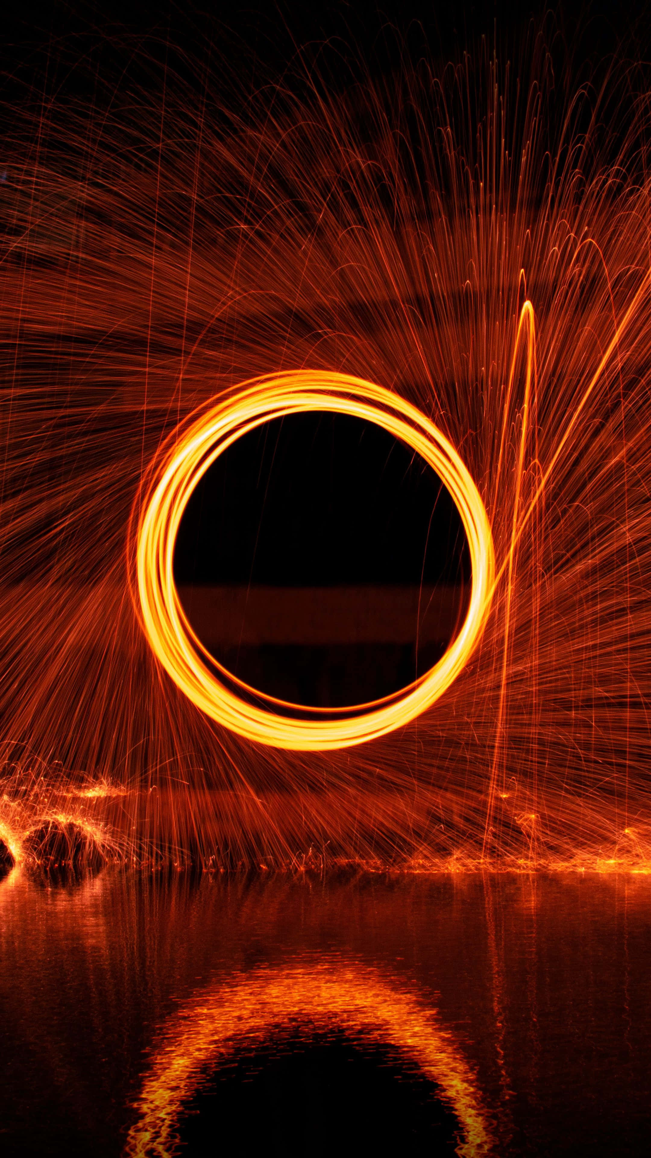 glowing orange ring of fire, dark night sky, calm water, 4K Phone Wallpaper