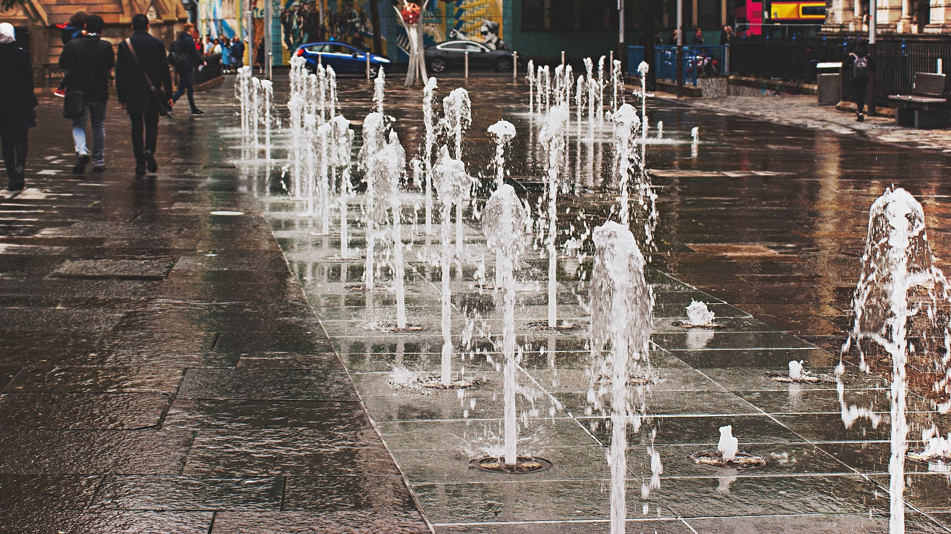 Urban plaza, fountains, water upward, Full HD Desktop Wallpaper