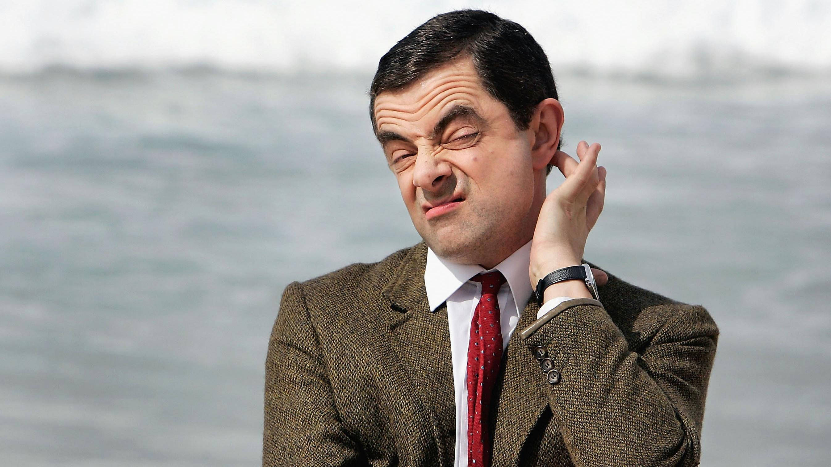 Mr Bean, brown tweed suit, red tie, 2K Desktop Wallpaper