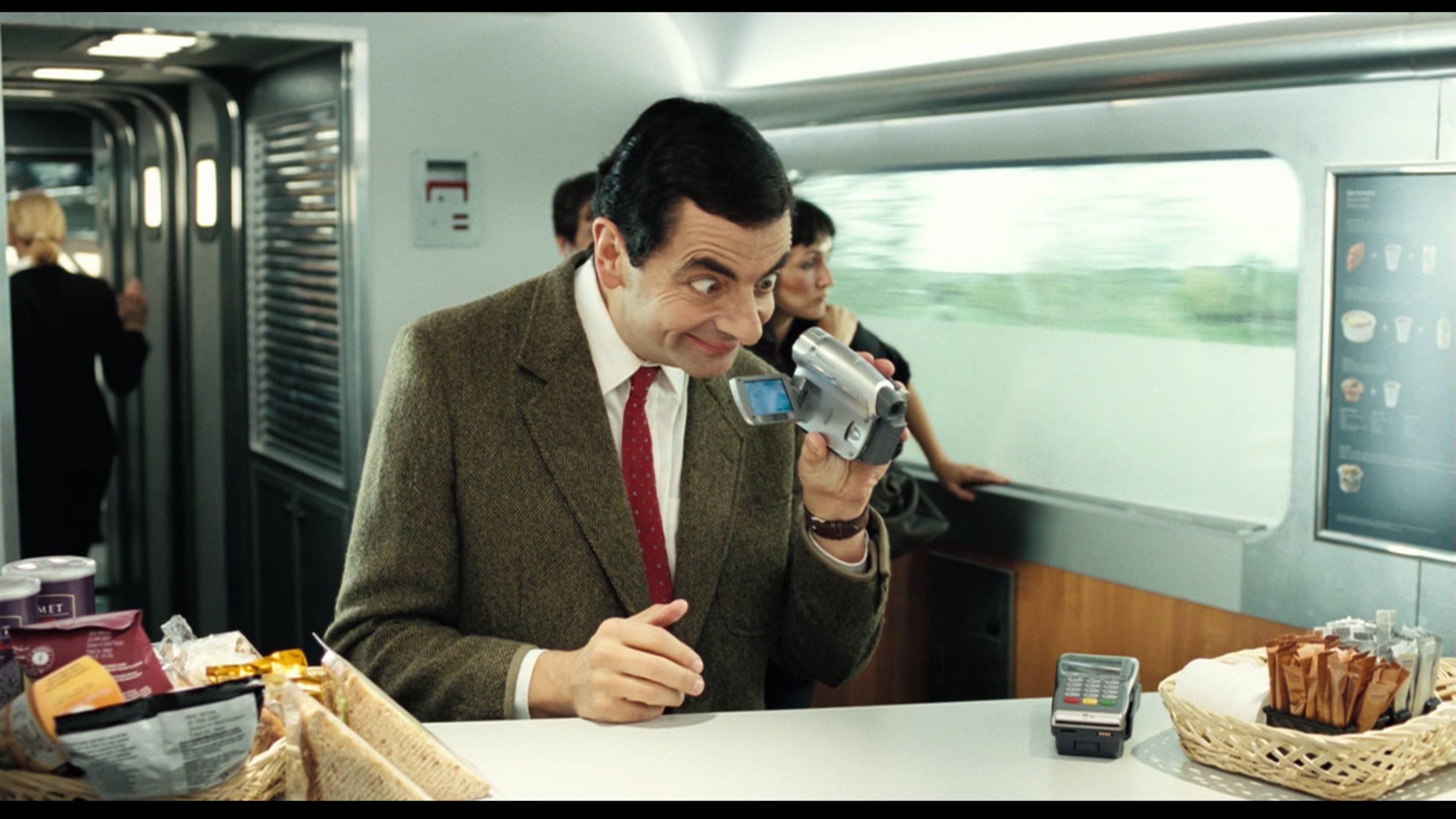 Mr Bean, handheld camcorder, moving train carriage, 4K Desktop Wallpaper