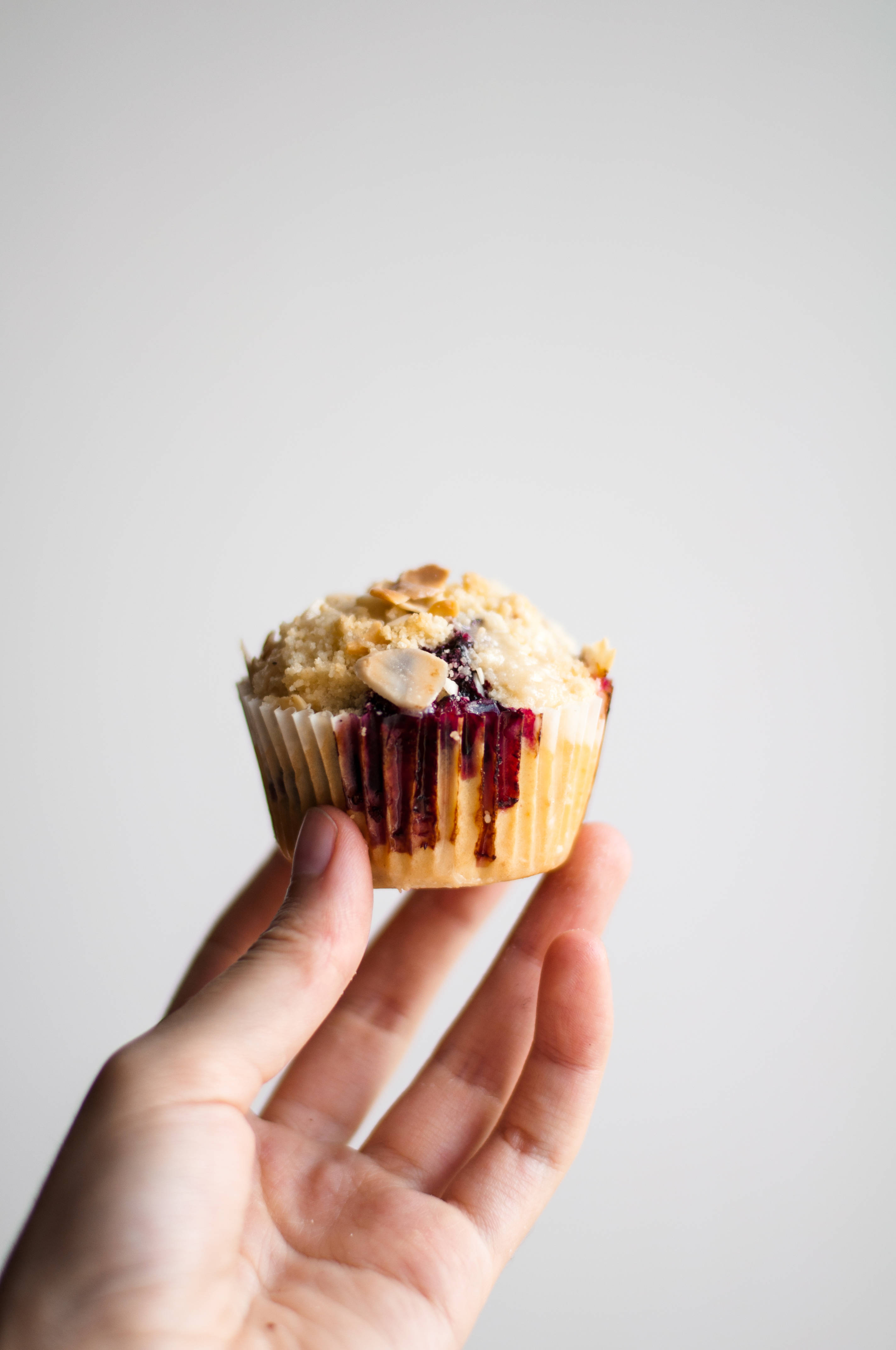 blueberry muffin, crumb topping, plain white background, 4K Phone Wallpaper