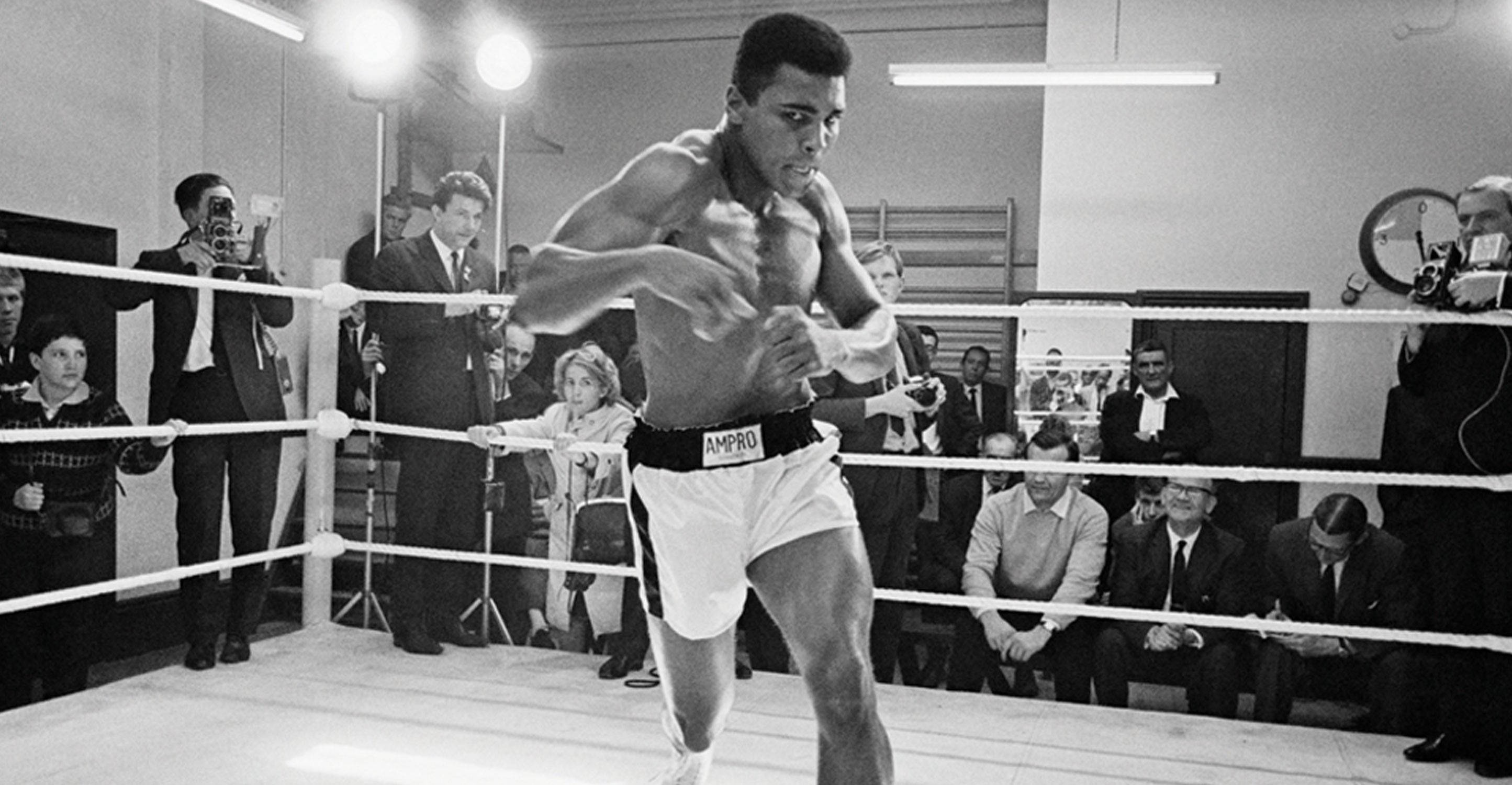 Muhammad Ali, boxing ring, mid-punch, 2K Desktop Wallpaper