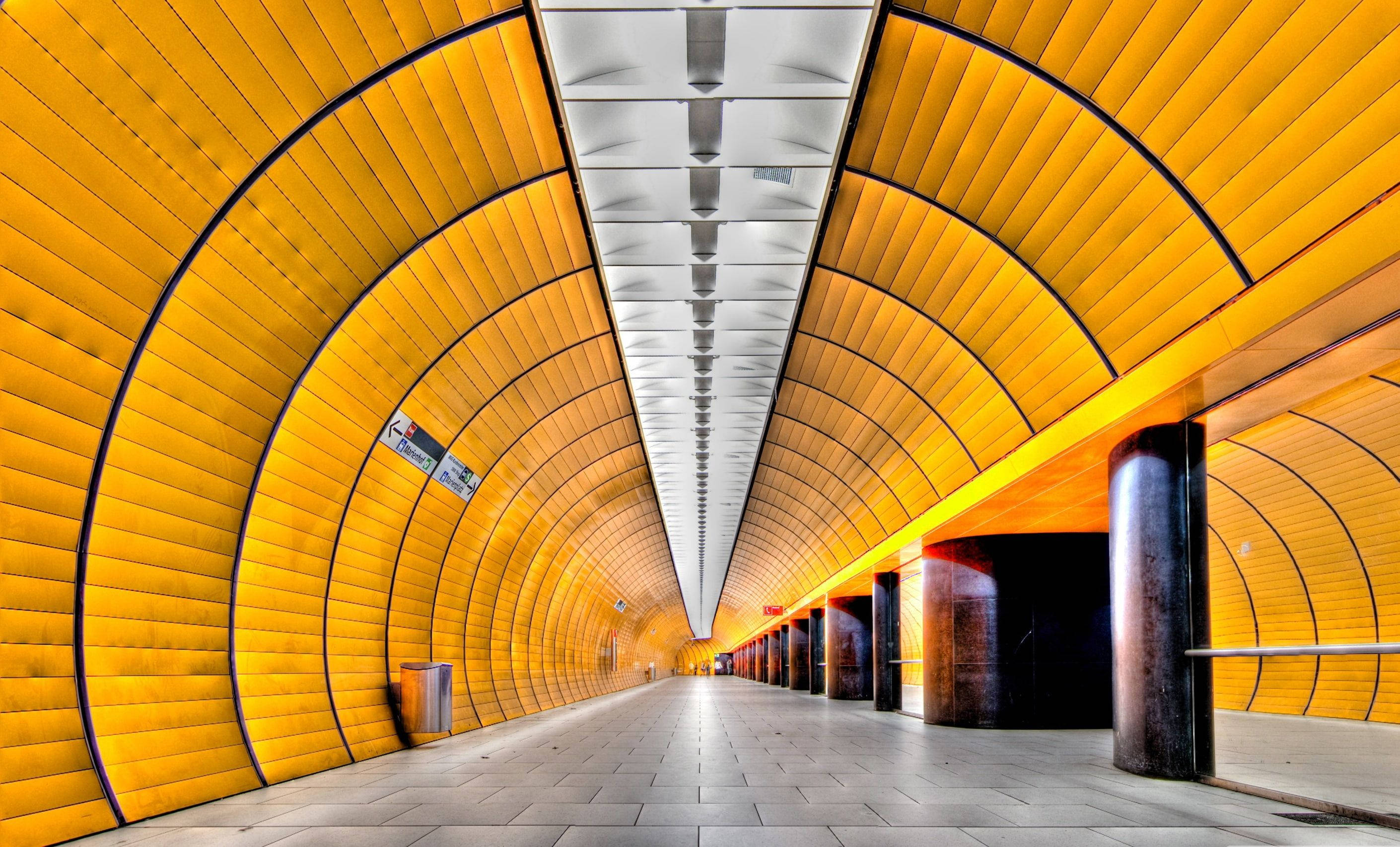 Munich, metro tunnel, vibrant yellow, 2K Desktop Wallpaper