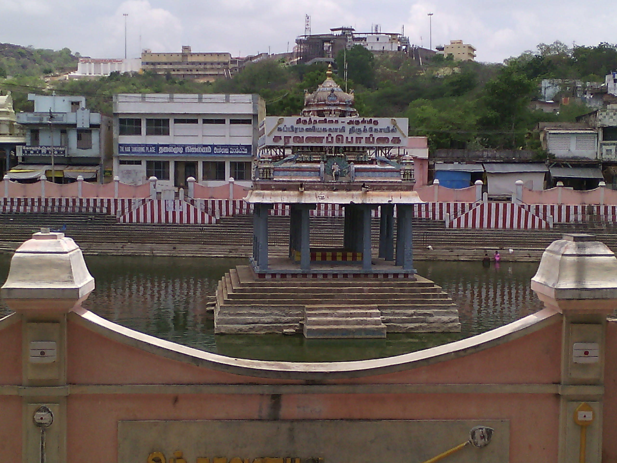 Lake Murugan Temple, red and white striped steps, water tank, 2K Desktop Wallpaper