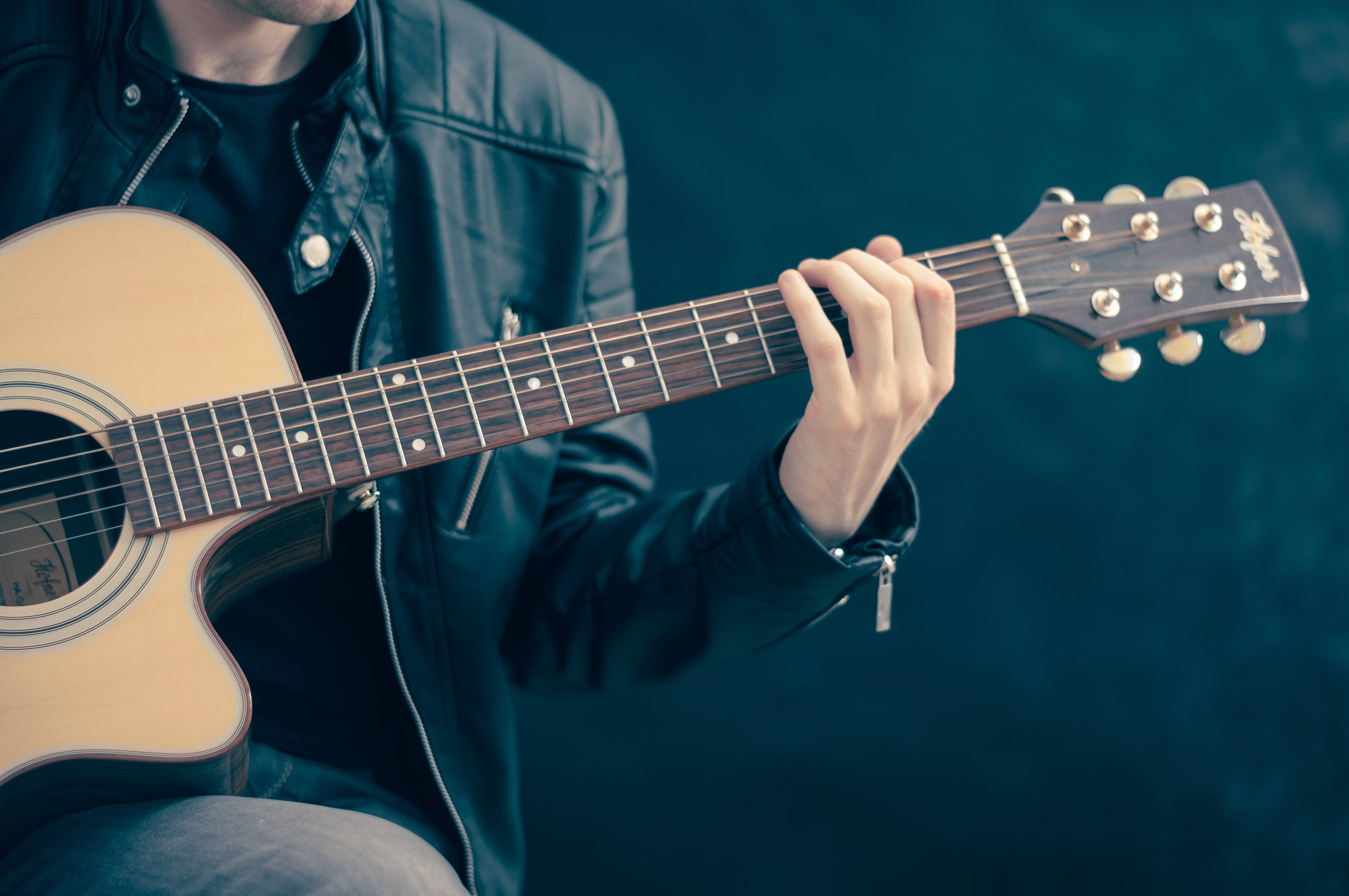 guitarist, acoustic guitar, black leather jacket, 4K Desktop Wallpaper