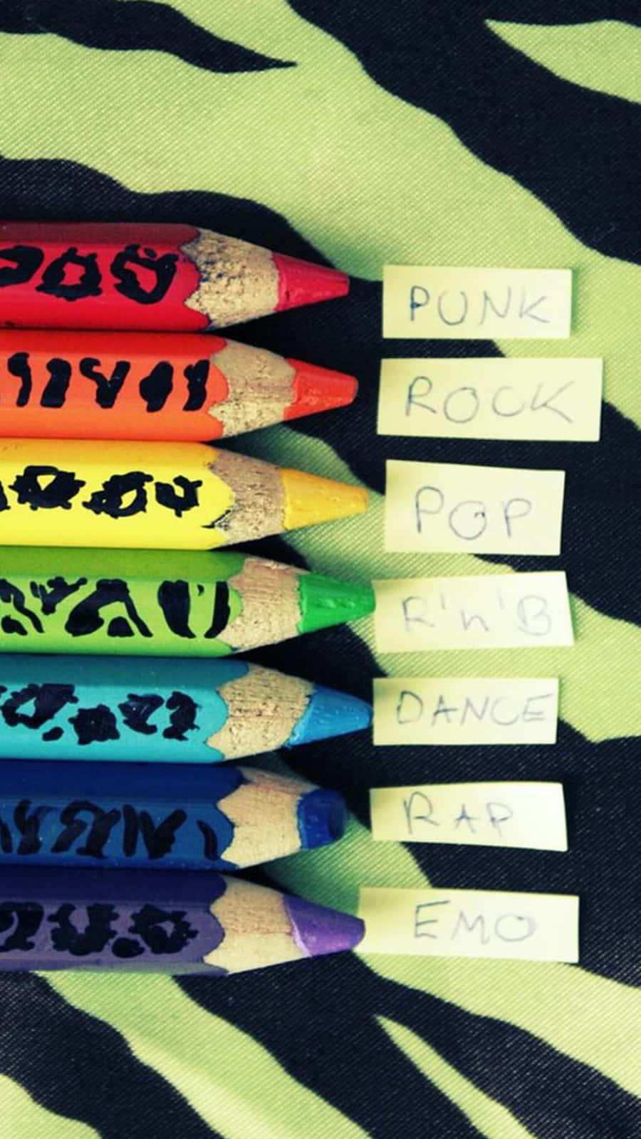 Vibrant colored pencils, graffiti-style music genres, bold green and black zebra-print fabric, HD Phone Wallpaper