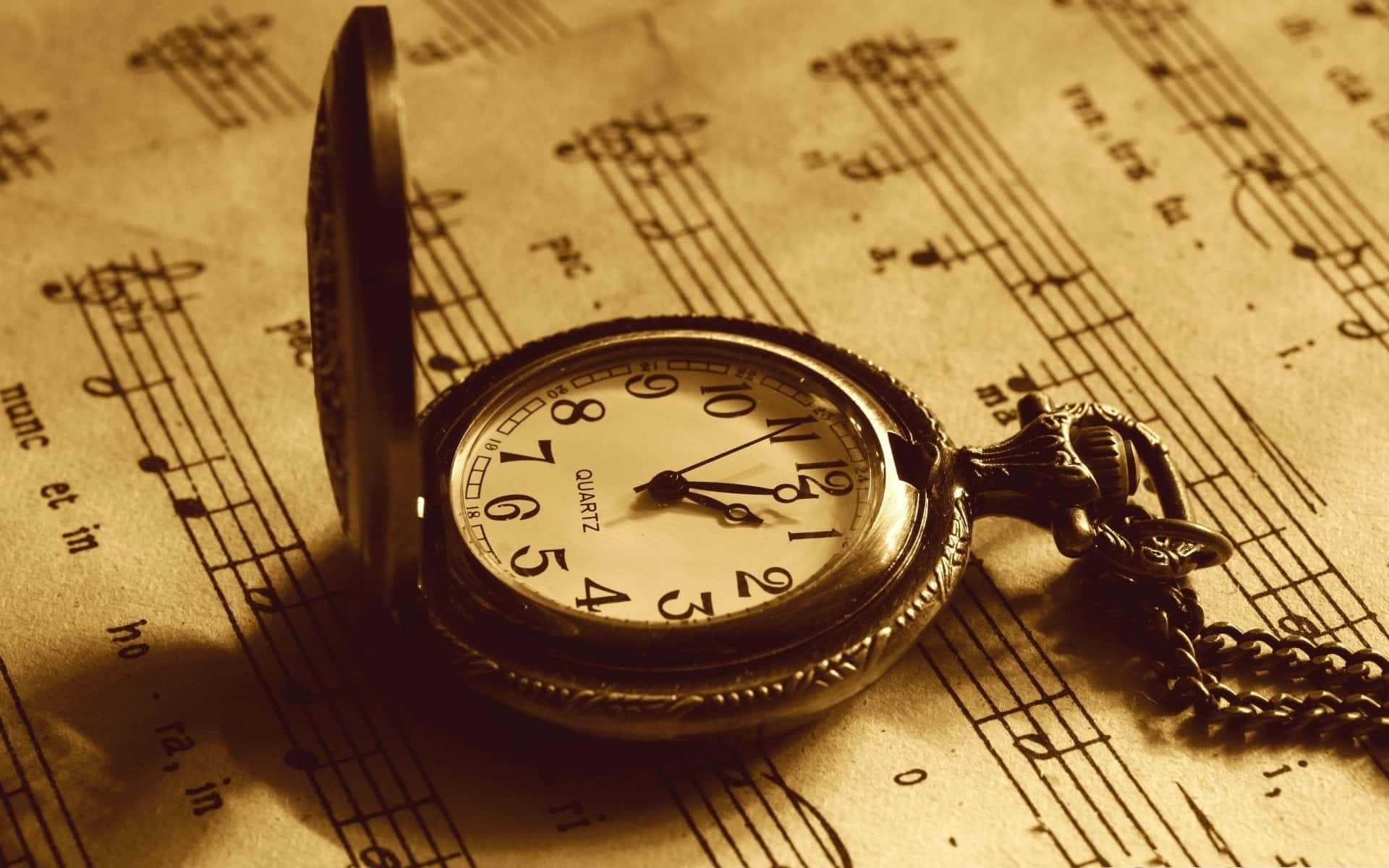 antique pocket watch, aged sheet music, warm sepia light, Full HD Desktop Wallpaper