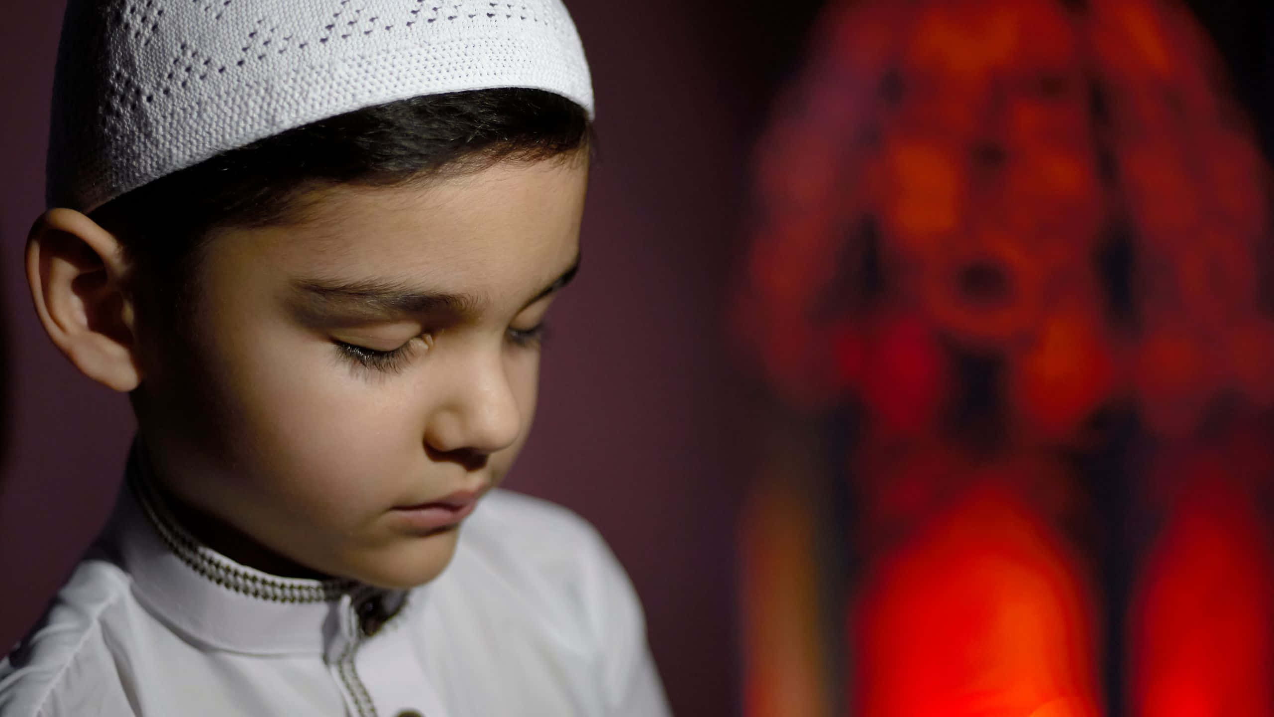 young Muslim Boy, white prayer cap, traditional attire, 2K Desktop Wallpaper