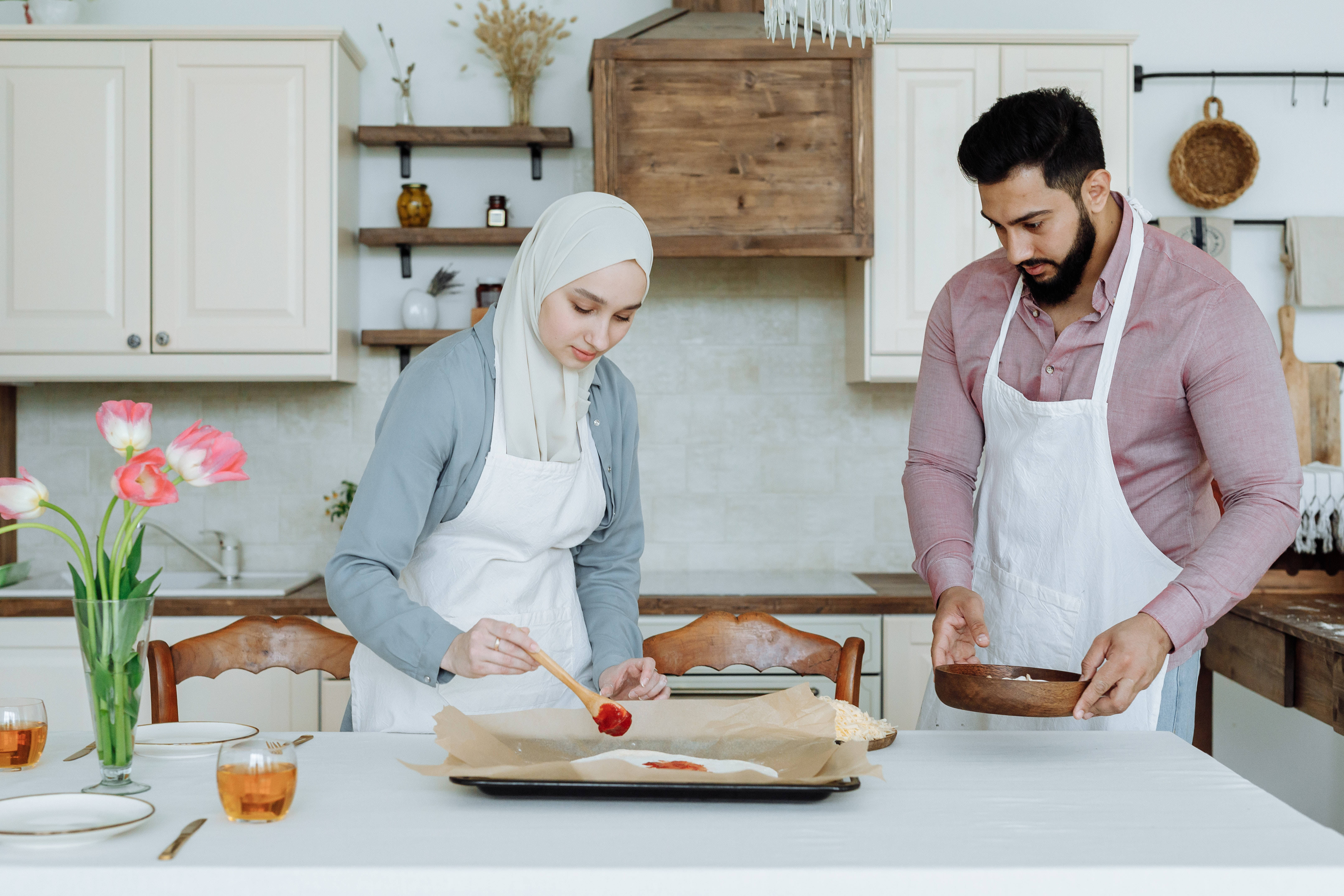 Muslim couple, white aprons, bright modern kitchen, 5K Desktop Wallpaper