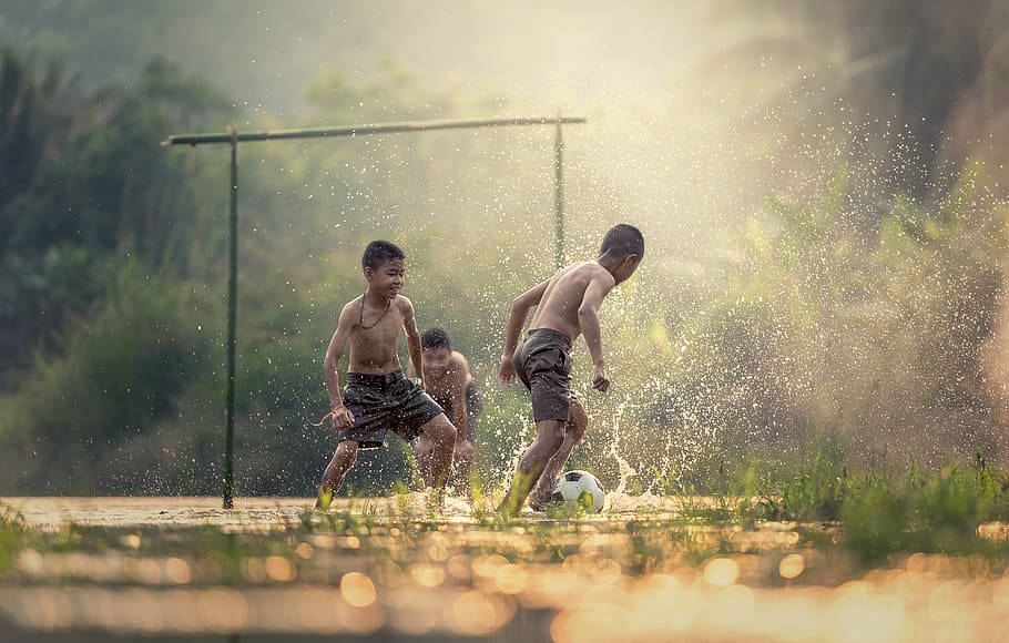 Myanmar, kids playing soccer, shallow water, SD Desktop Wallpaper