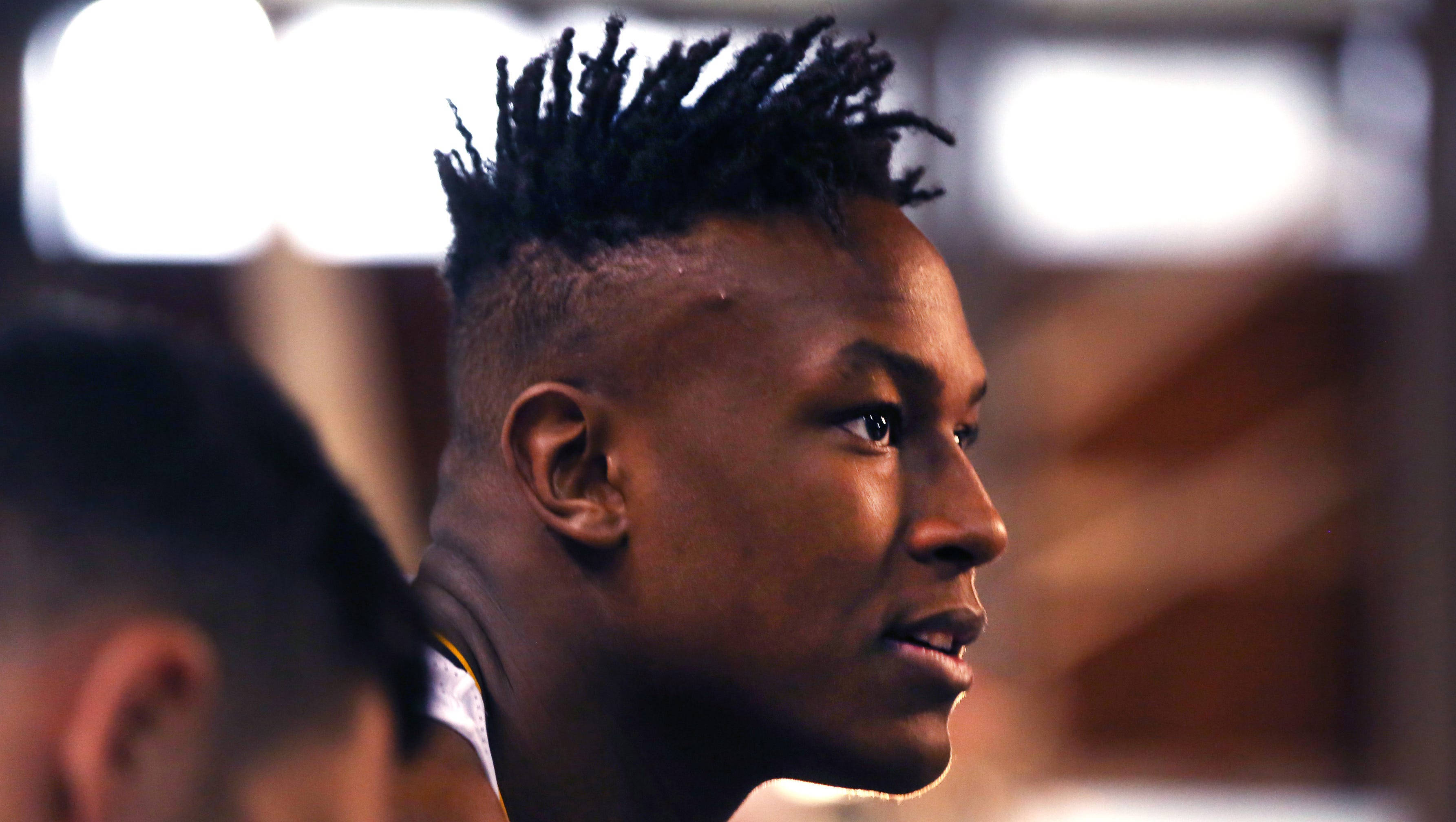 Myles Turner, spiked mohawk hairstyle, soft studio lighting, 2K Desktop Wallpaper