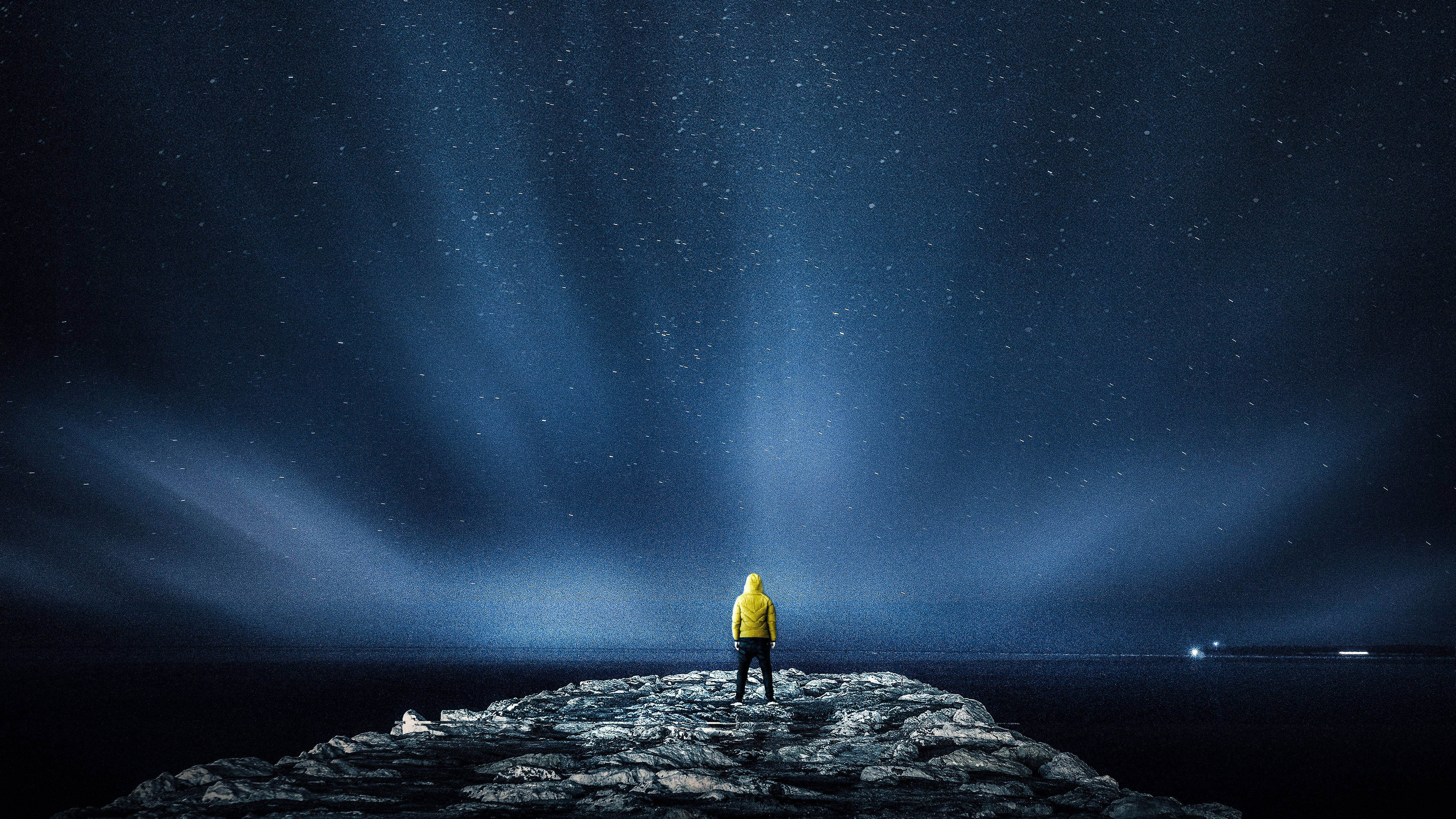 Mystery Man, yellow hooded jacket, rocky cliff, 4K Desktop Wallpaper