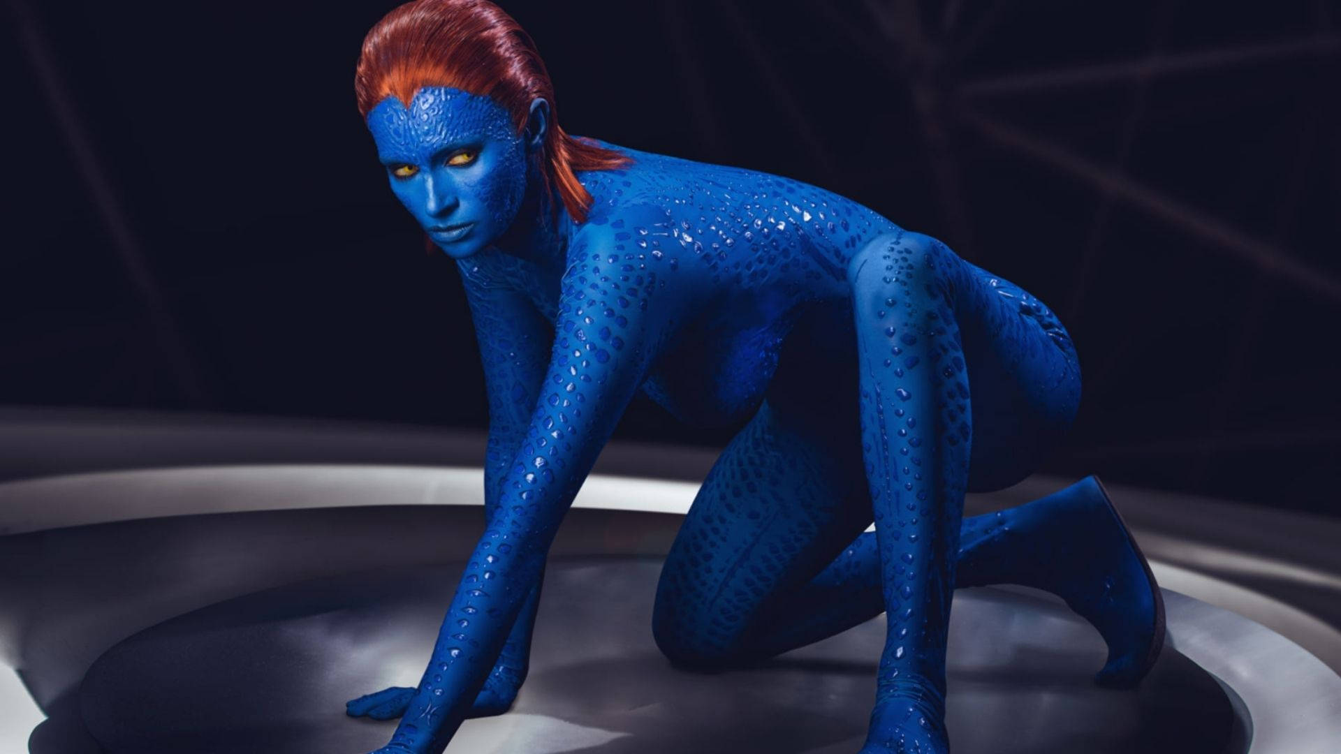 Mystique, blue-skinned mutant, glowing yellow eyes, Full HD Desktop Wallpaper