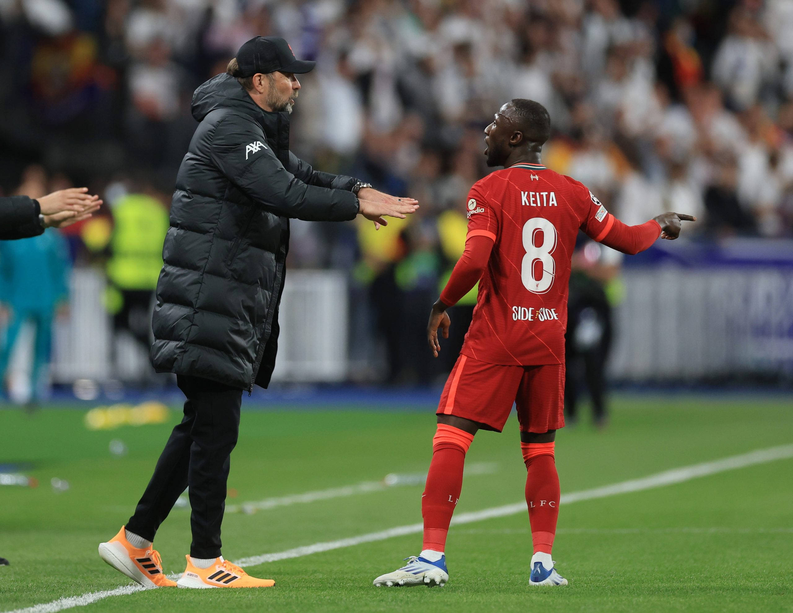 Naby Keita, black puffer jacket, red-uniformed player, 2K Desktop Wallpaper
