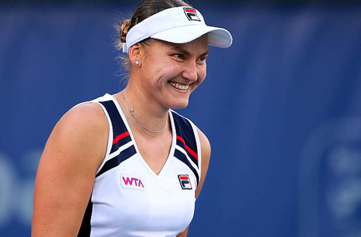 Nadia Petrova, white visor, WTA branded top, SD Desktop Wallpaper