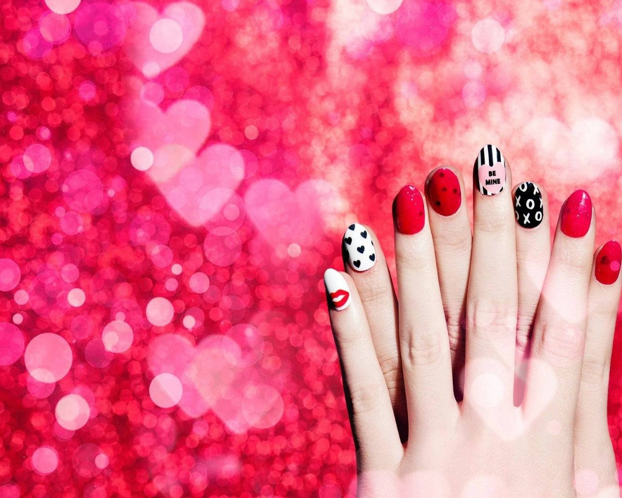red and black nail art, sparkling pink heart bokeh background, hand, 2K Desktop Wallpaper