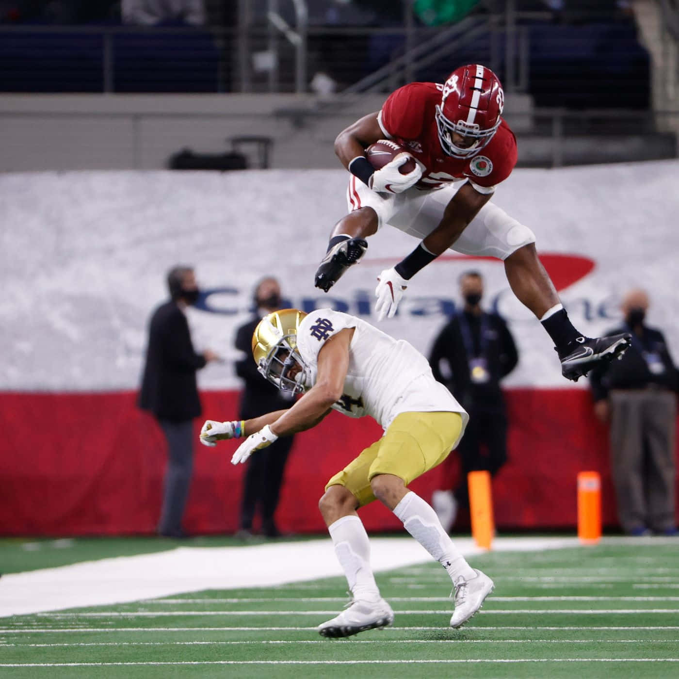 Najee Harris, red-uniformed football player, defender in white and gold, HD Desktop Wallpaper