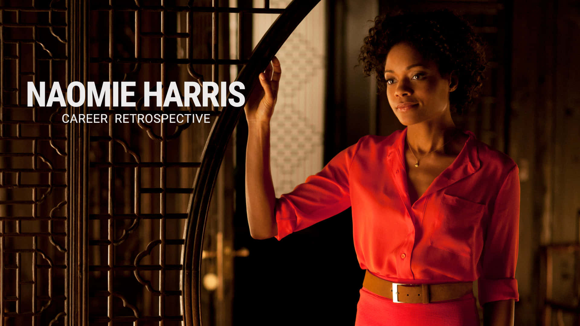 Naomie Harris, vibrant red blouse, ornate staircase, Full HD Desktop Wallpaper