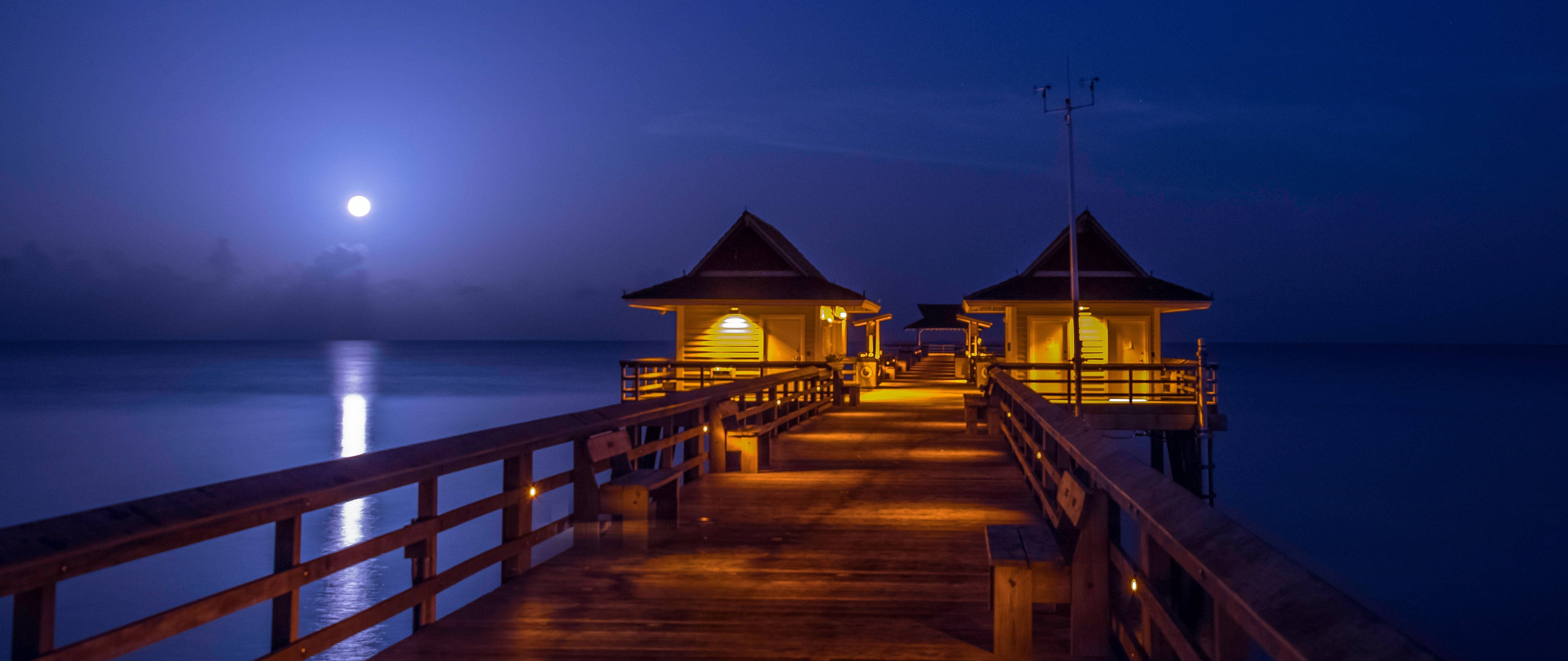Naples, moonlit wooden pier, calm ocean water, 5K Desktop Wallpaper