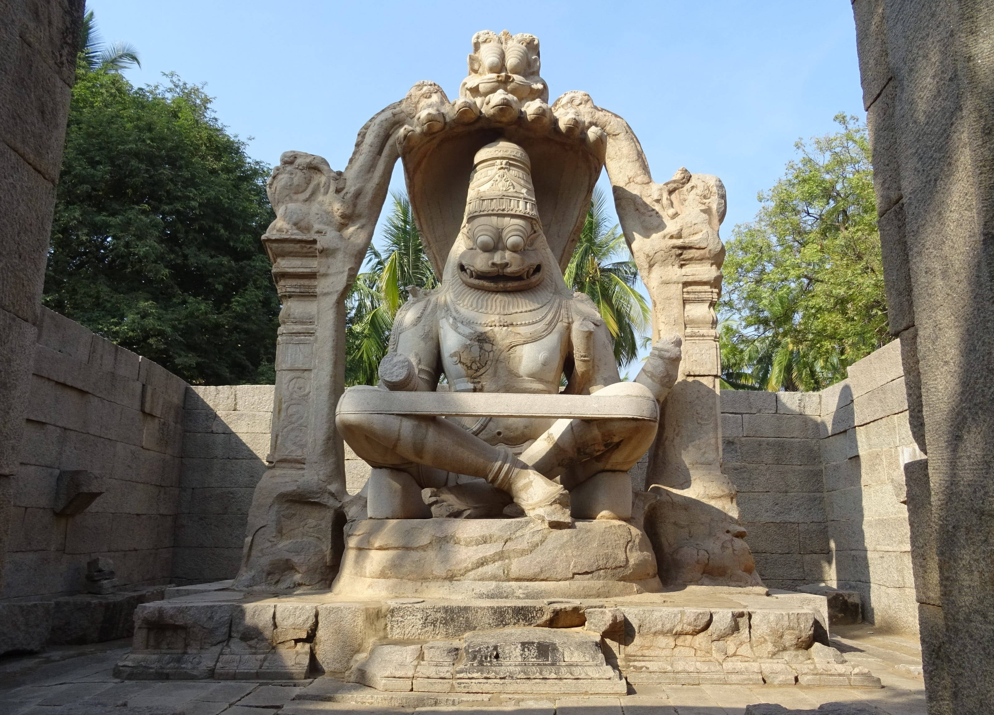 Narasimha, concrete statue, seated deity, 2K Desktop Wallpaper