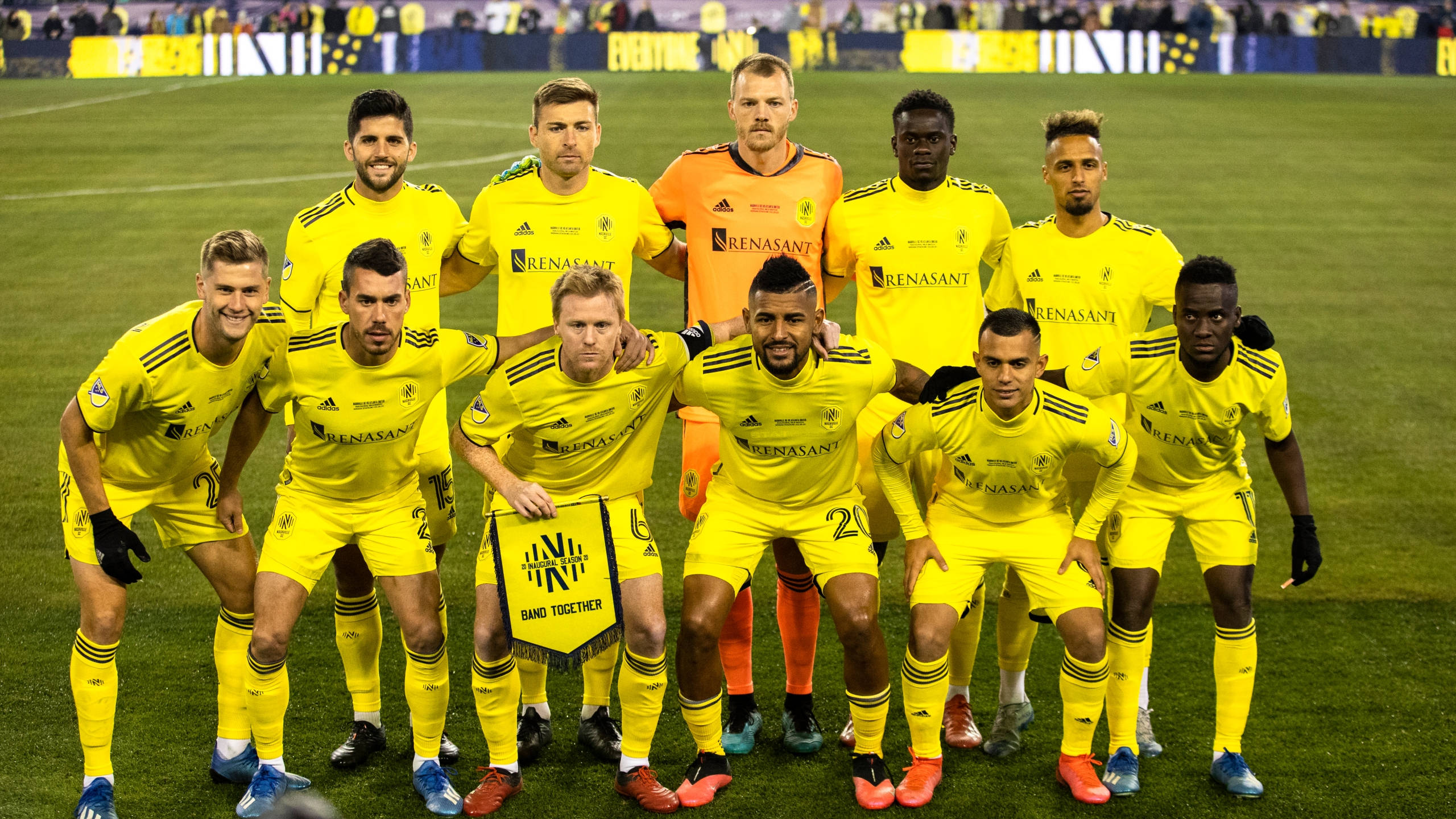 Nashville SC, bright yellow uniforms, green field, 2K Desktop Wallpaper