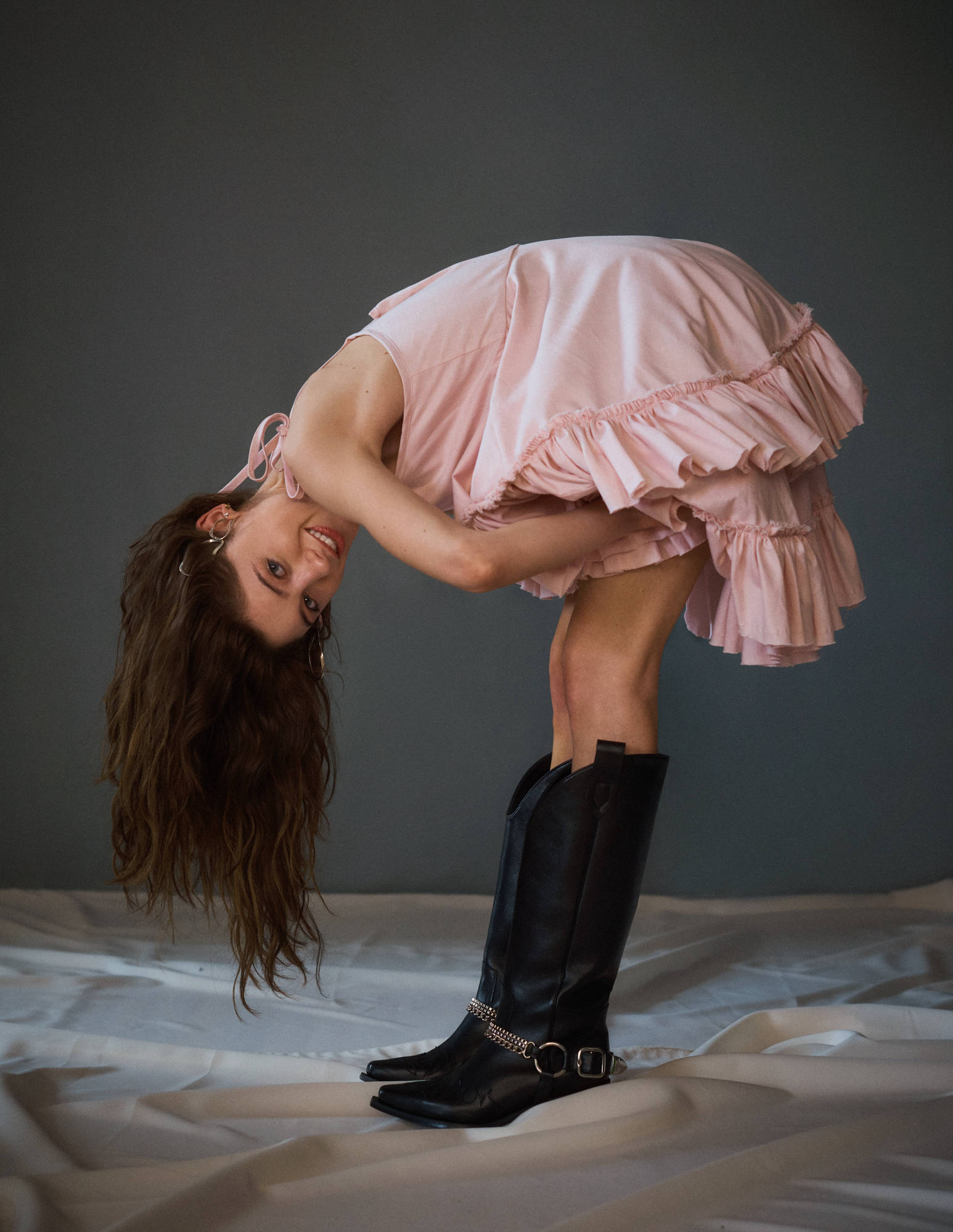 Natalia Dyer, pink ruffled dress, black boots, Full HD Phone Wallpaper