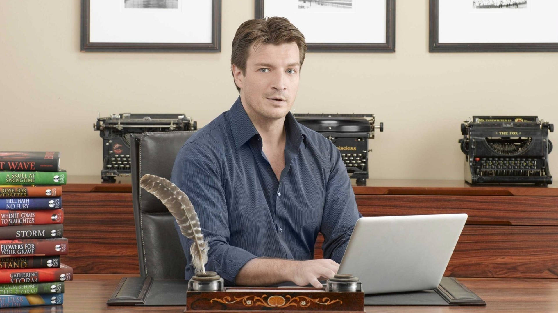 Nathan Fillion, blue shirt, wooden desk, Full HD Desktop Wallpaper