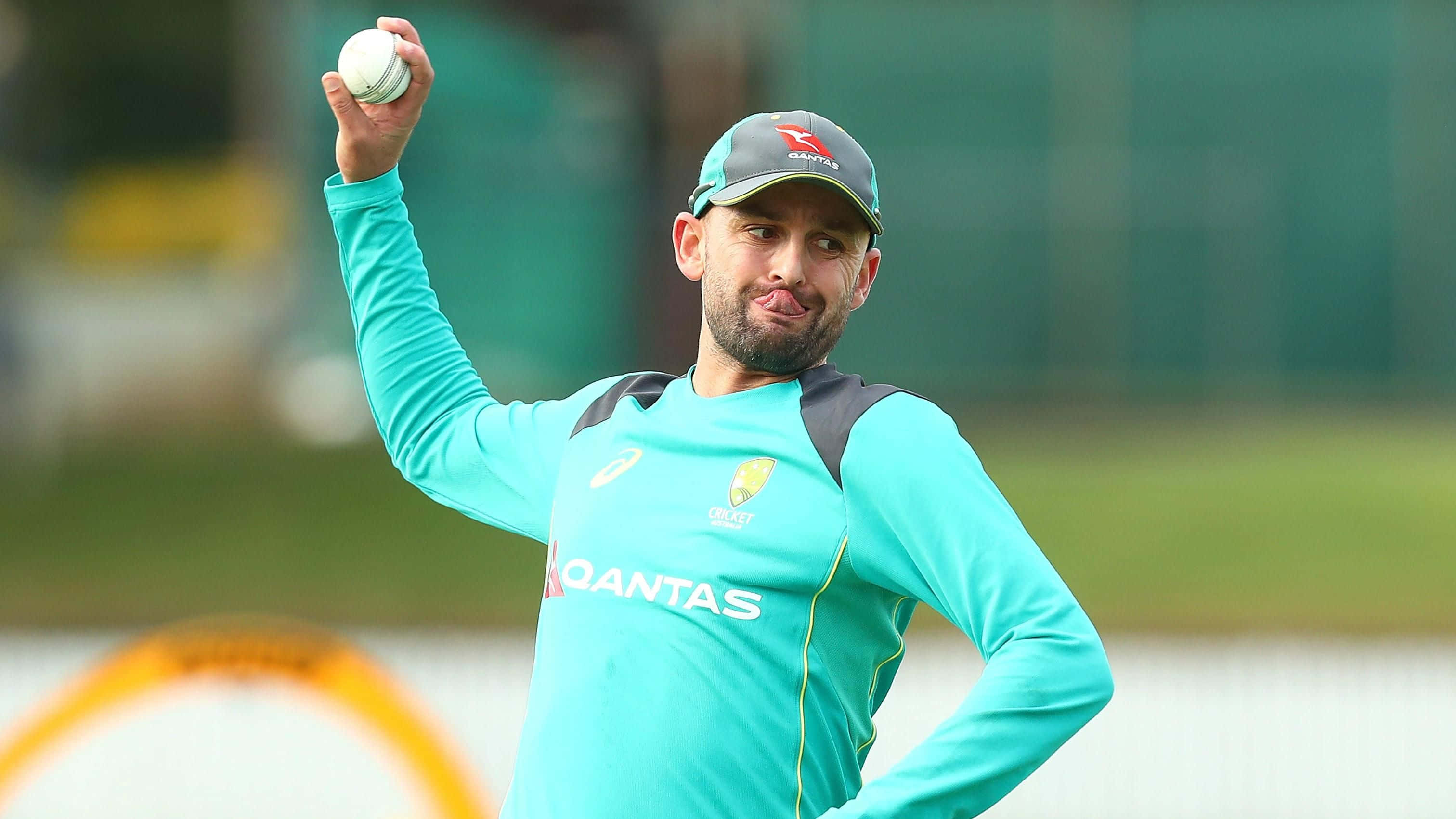 Nathan Lyon, teal training gear, green field, 2K Desktop Wallpaper