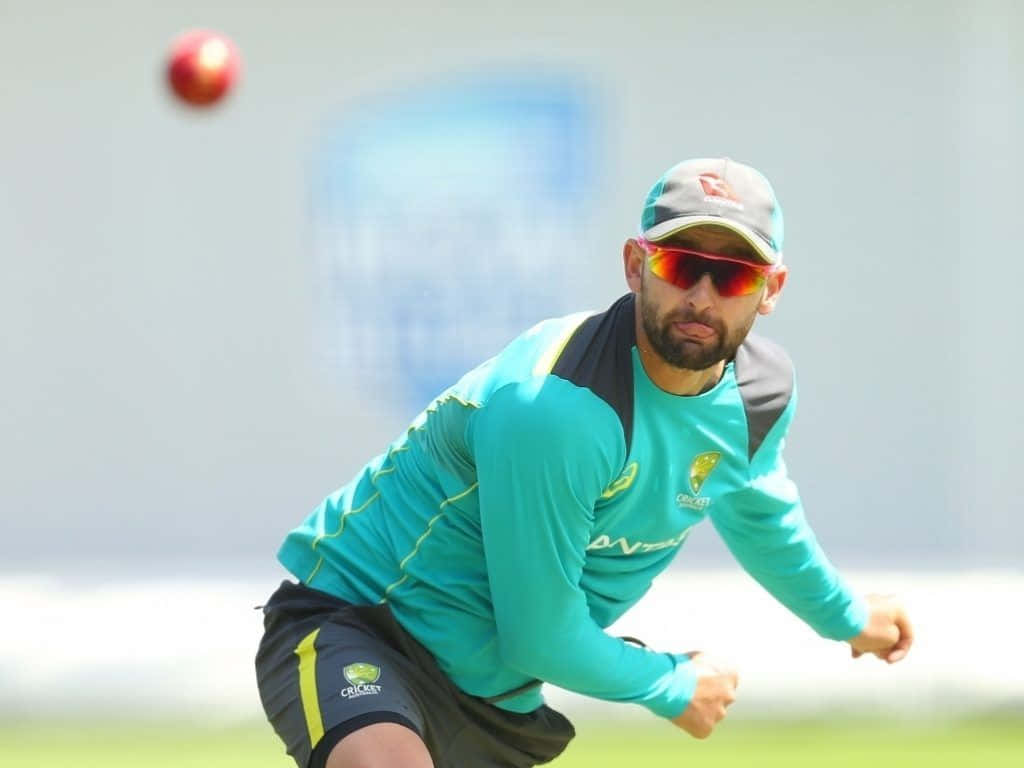 Nathan Lyon, teal uniform, red sunglasses, SD Desktop Wallpaper