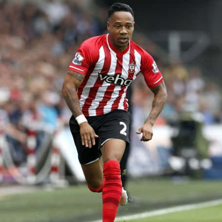 Nathaniel Clyne, red and white striped jersey, green pitch, SD Desktop Wallpaper
