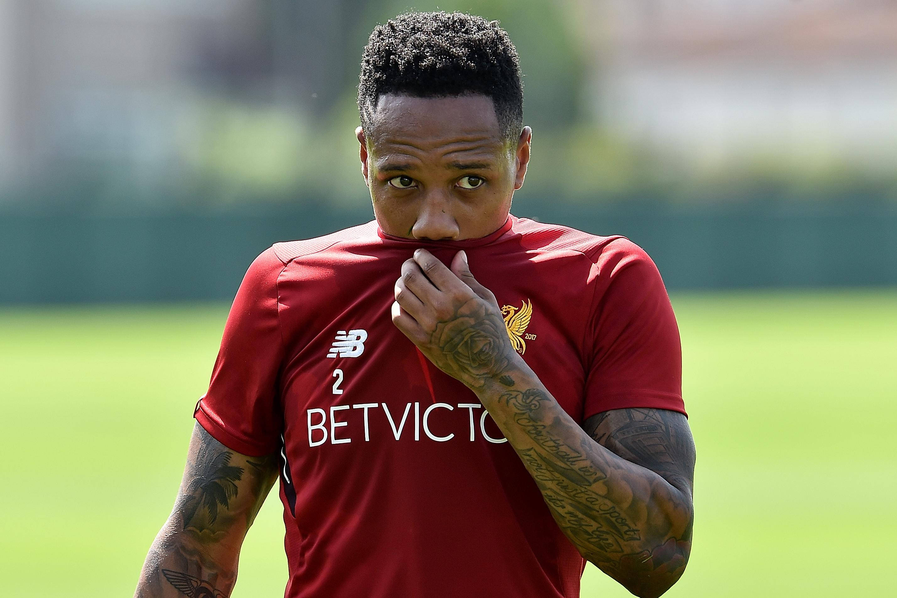 Nathaniel Clyne, red training kit, tattoos on his arms, 2K Desktop Wallpaper