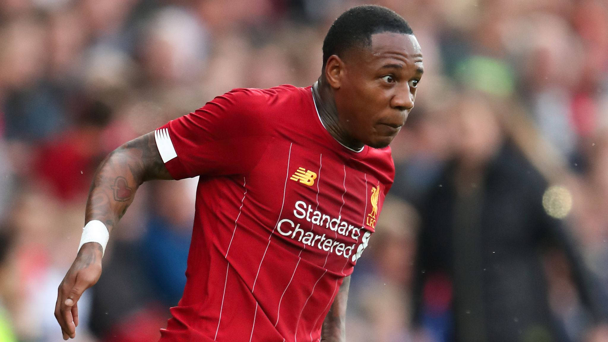 Nathaniel Clyne, red Liverpool jersey, sunlit stadium, Full HD Desktop Wallpaper
