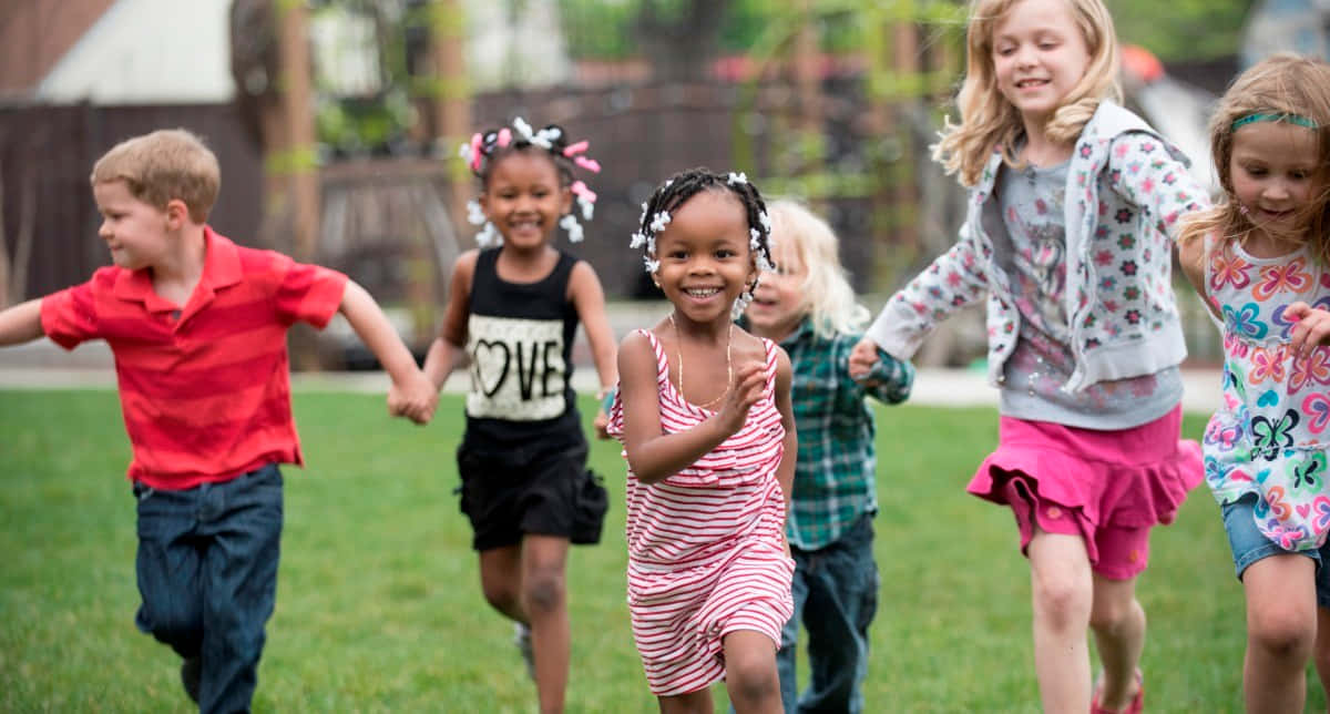 joyful children, sunlit grassy yard, colorful casual clothes, SD Desktop Wallpaper