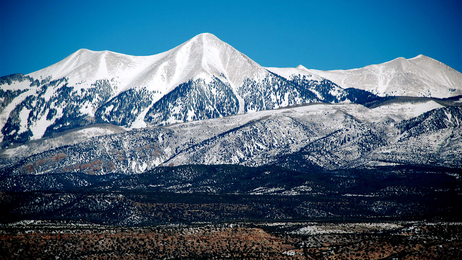 National Geographic Desktop, snow-capped mountain peaks, clear blue sky, Full HD Desktop Wallpaper