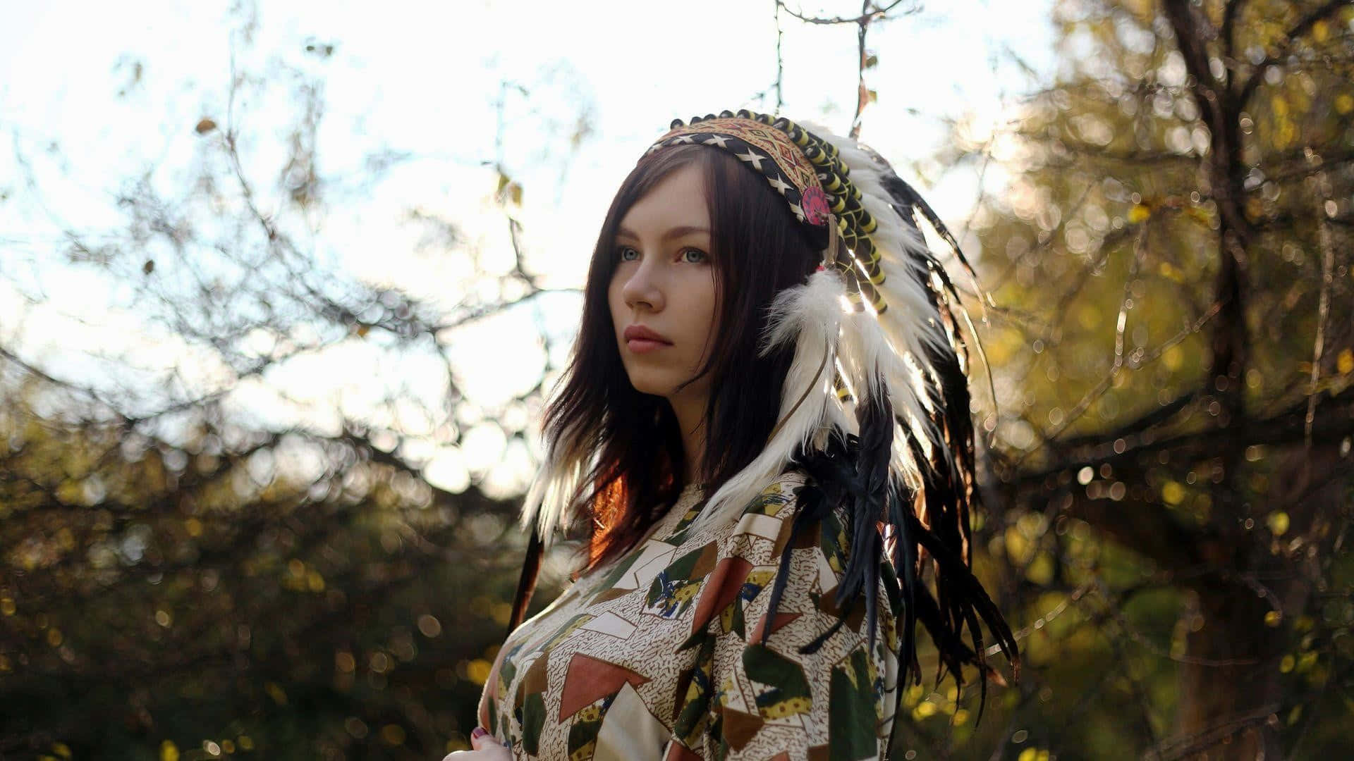feathered headdress, patterned garment, sunlit autumn forest, Full HD Desktop Wallpaper