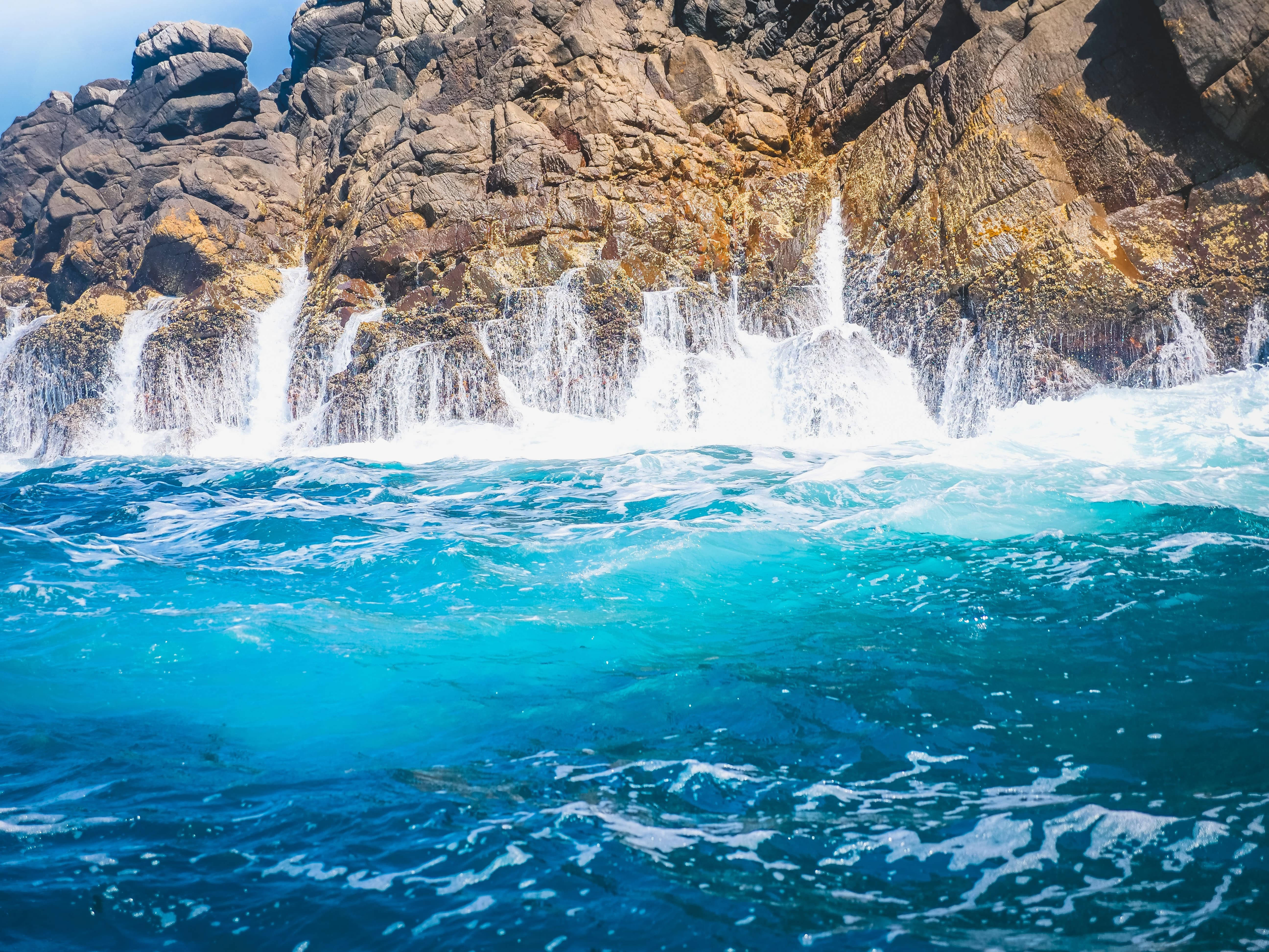 Turquoise ocean, rugged cliffs, cascading waterfalls, 5K Desktop Wallpaper