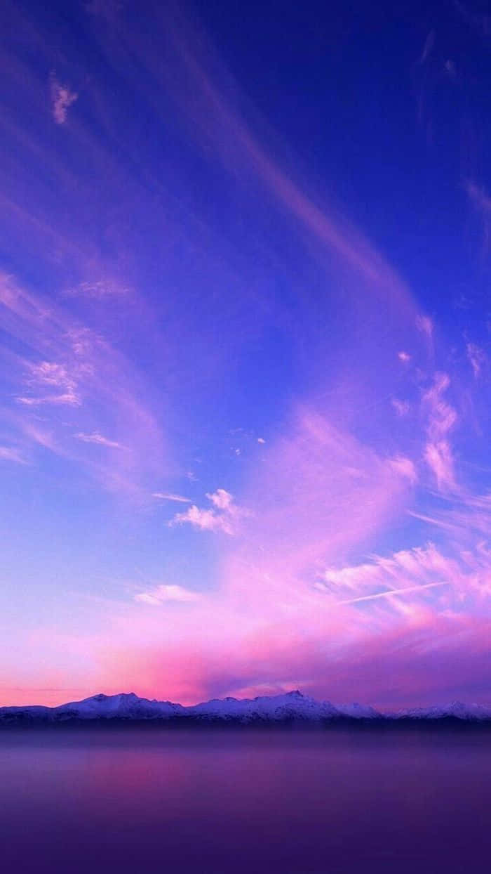 mountain range, vibrant purple and pink twilight sky, wispy clouds, SD Phone Wallpaper