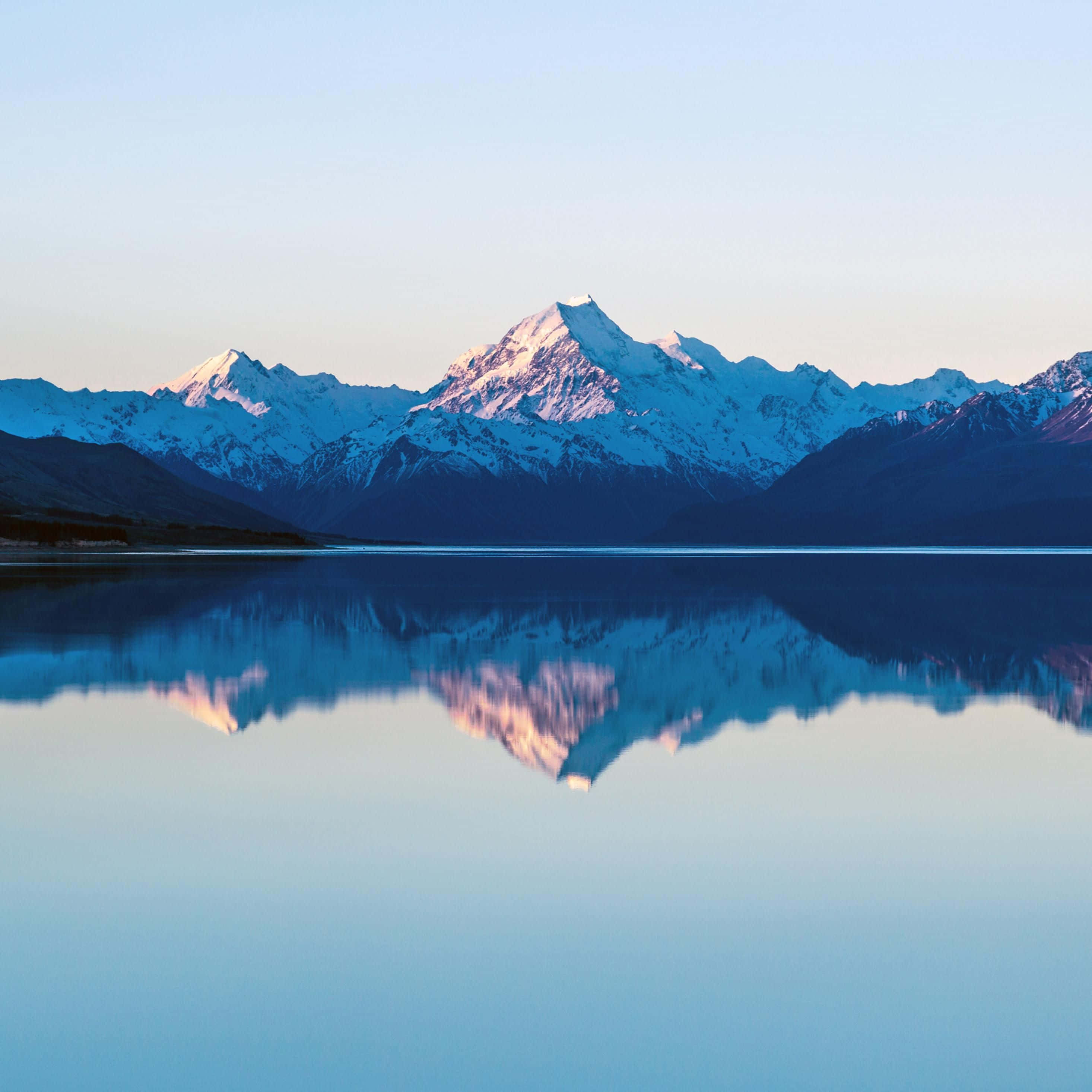 iPad, snowcapped mountains, glassy lake, 2K Desktop Wallpaper