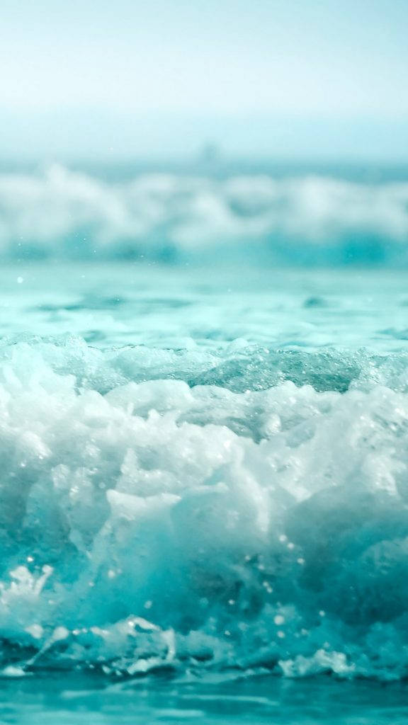 turquoise ocean waves, white foam, soft daylight, SD Phone Wallpaper