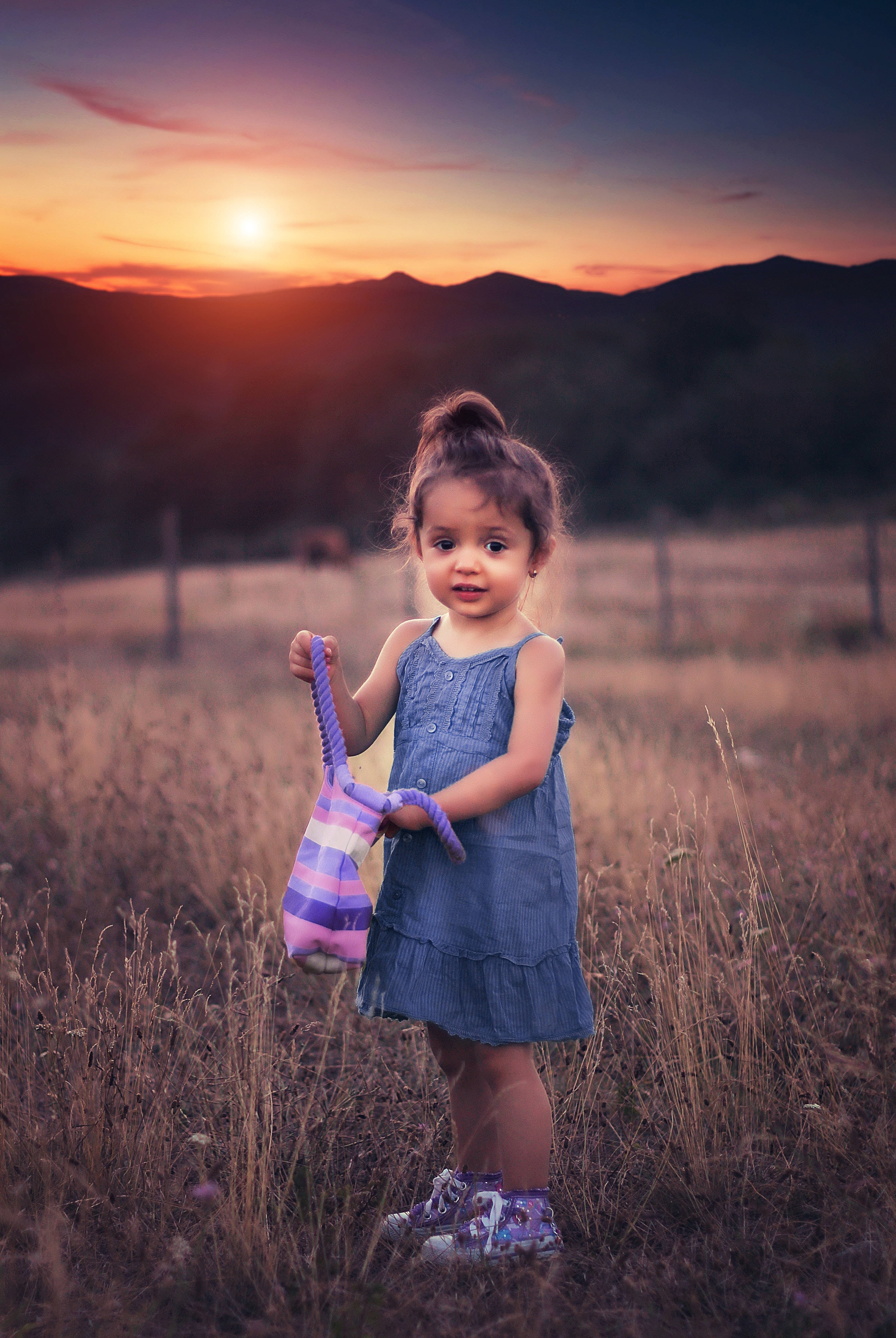 denim dress, striped bag, tall grass, 4K Phone Wallpaper