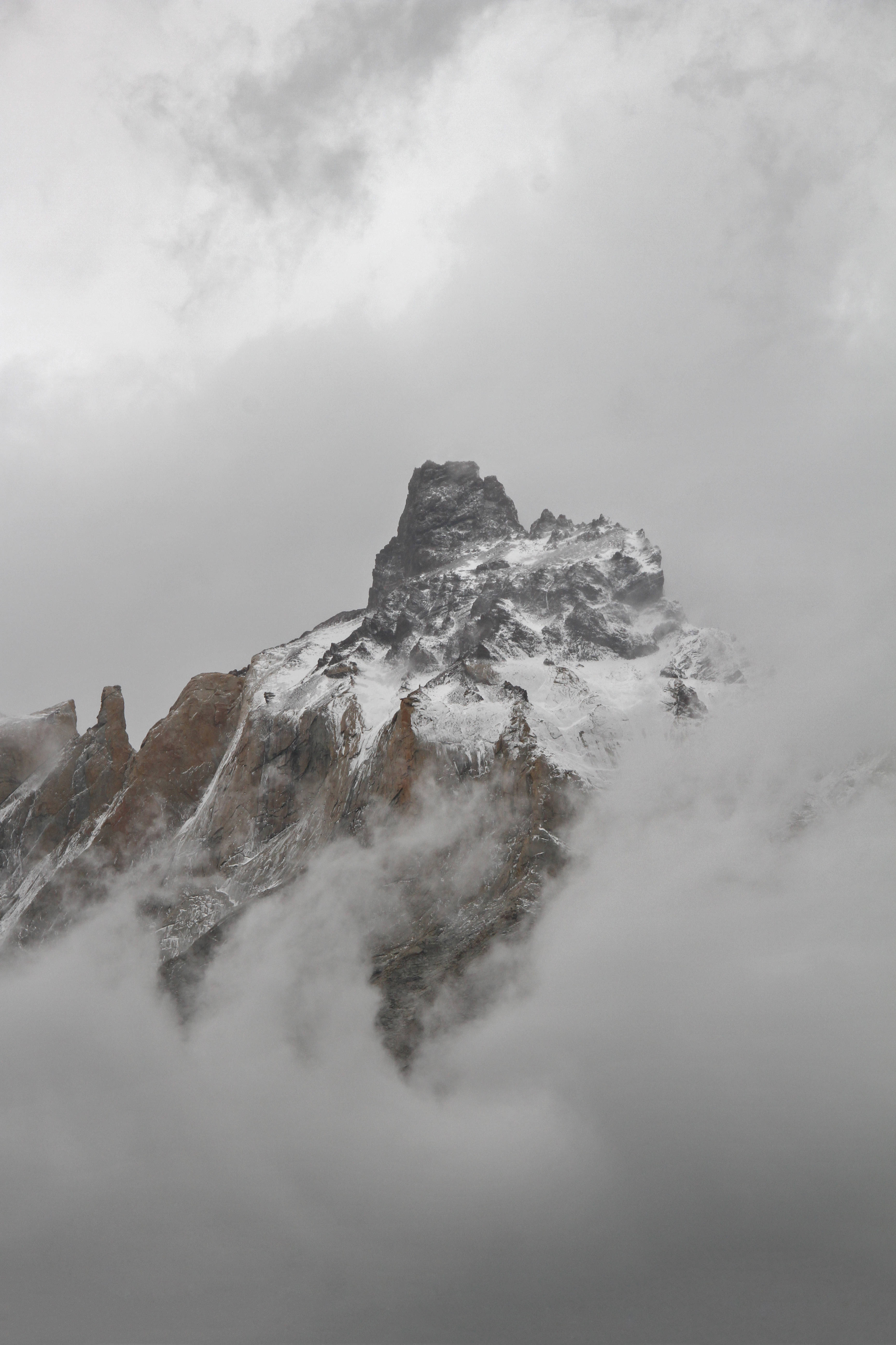 cloudy snowy mountain peak, snow-capped mountain peak, thick gray clouds, 5K Phone Wallpaper