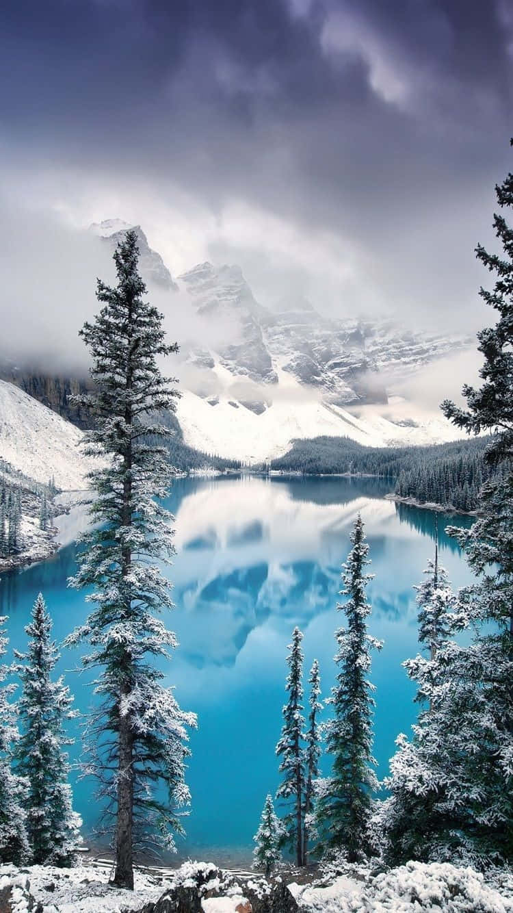 winter wonder, snow-covered mountain lake, dramatic cloudy sky, HD Phone Wallpaper