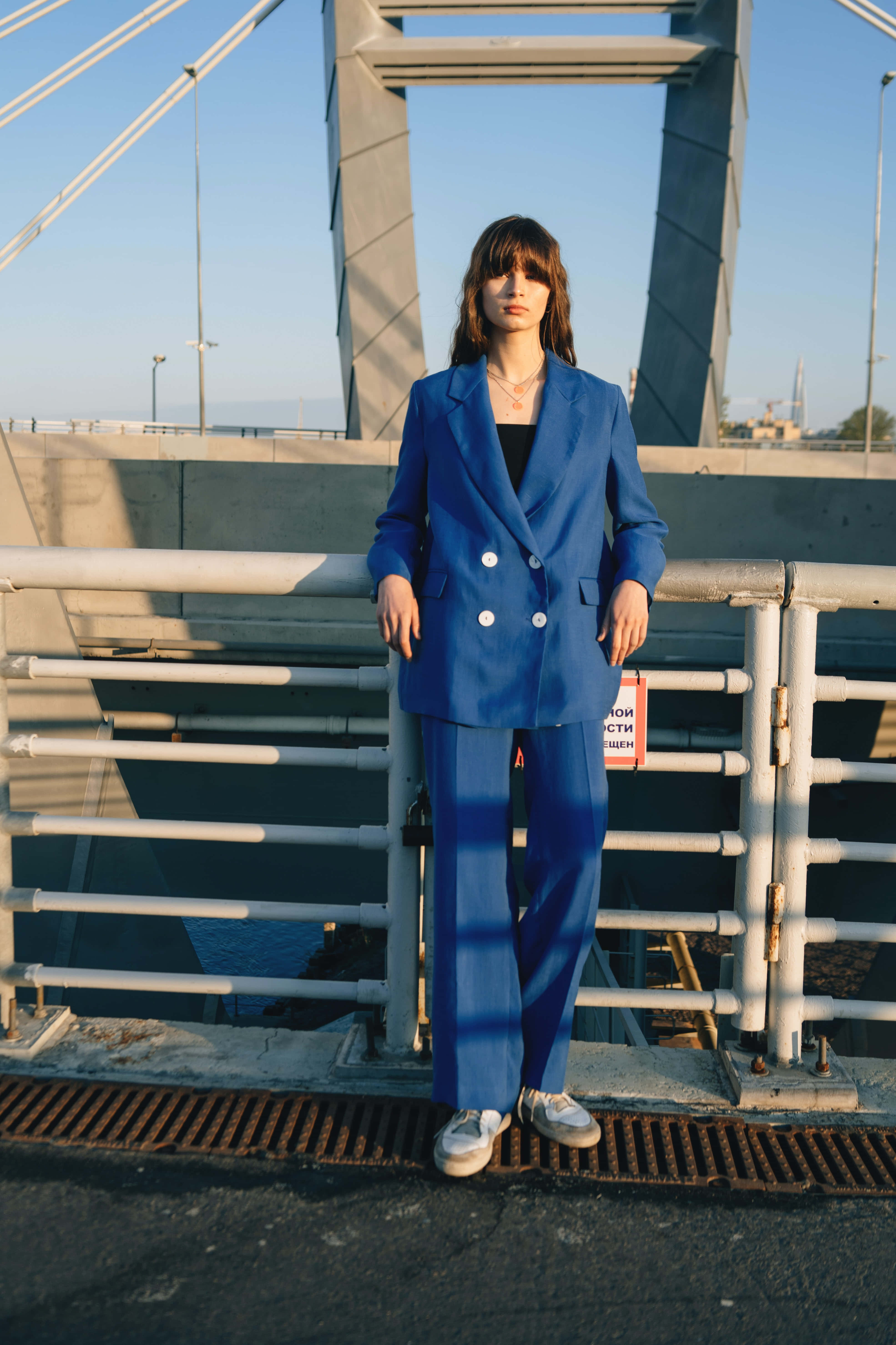 Elegant Navy Blue Blazer, golden hour, bridge railing, 5K Phone Wallpaper