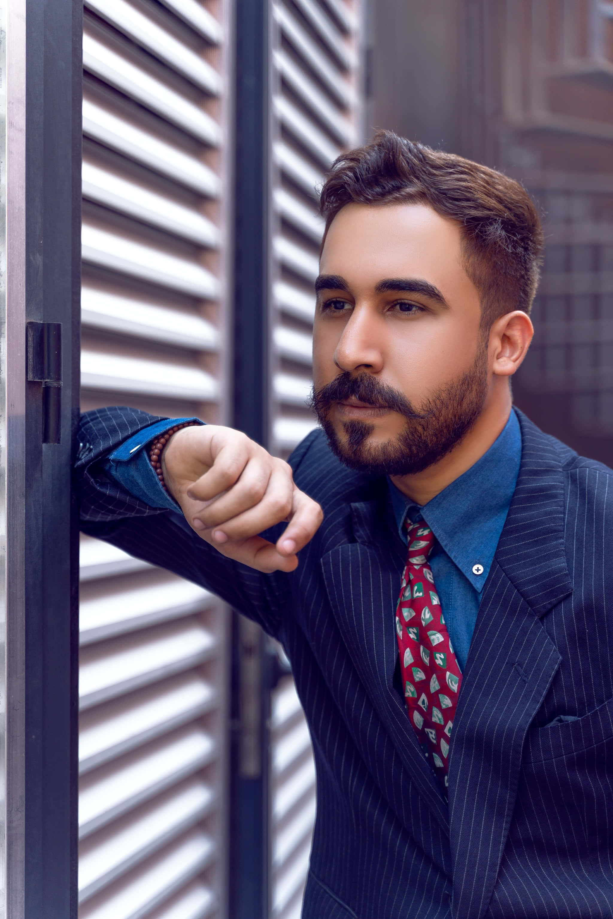 Navy Blue Blazer, metal shuttered window, urban portrait, 2K Phone Wallpaper