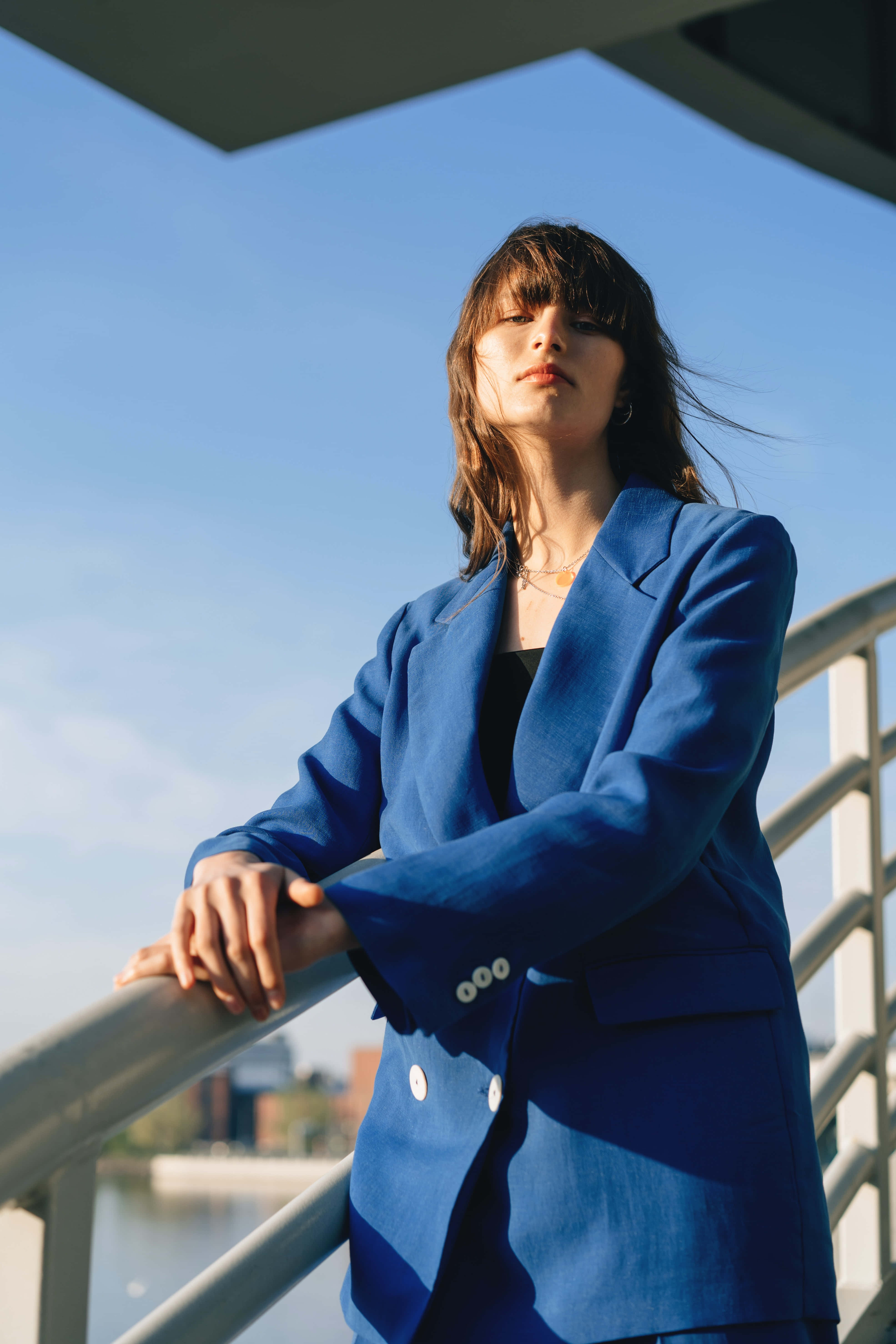 Navy Blue Blazer, clear blue sky, cityscape, 5K Phone Wallpaper