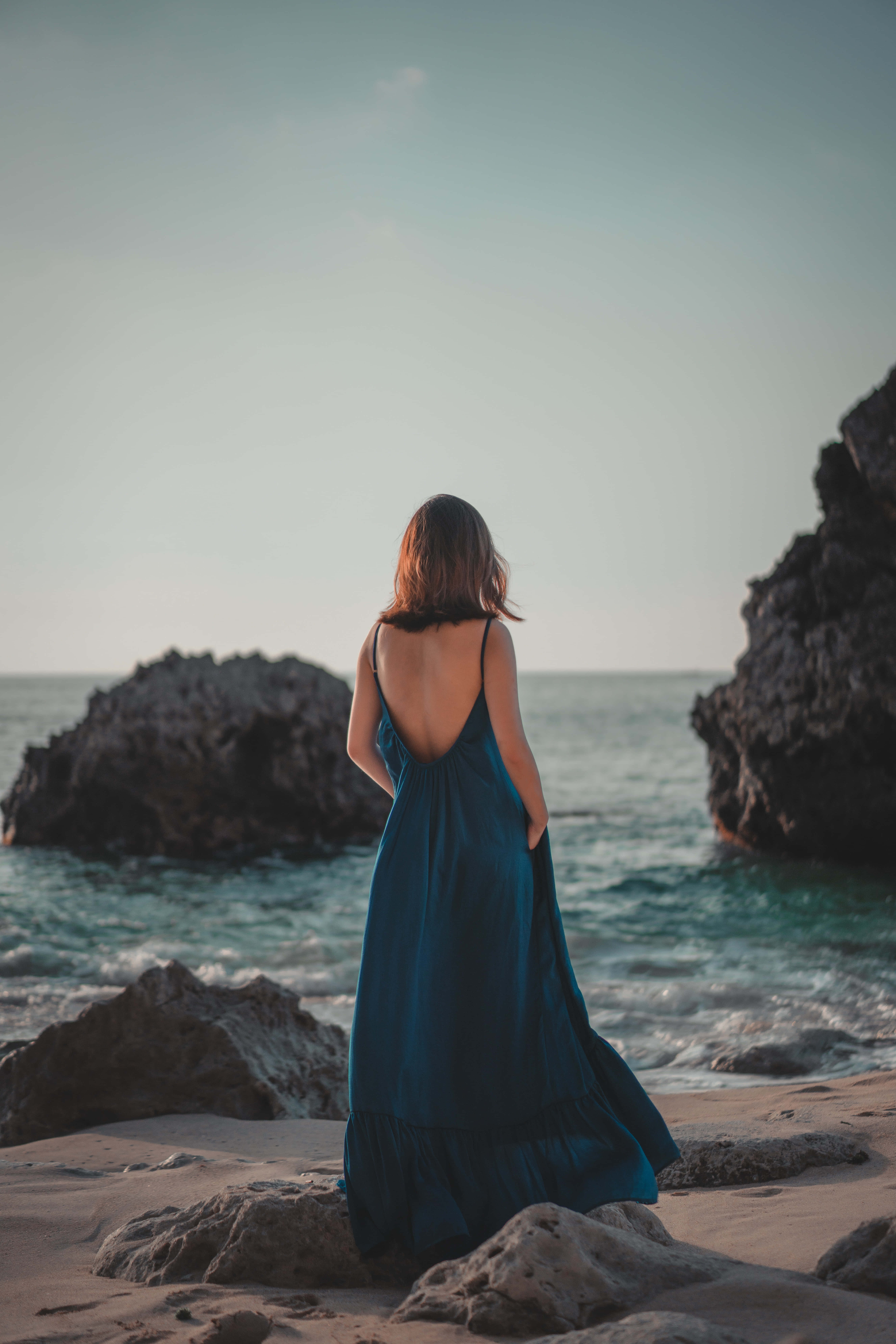 Navy Blue Dress, rocky beach, sunset, 8K Phone Wallpaper