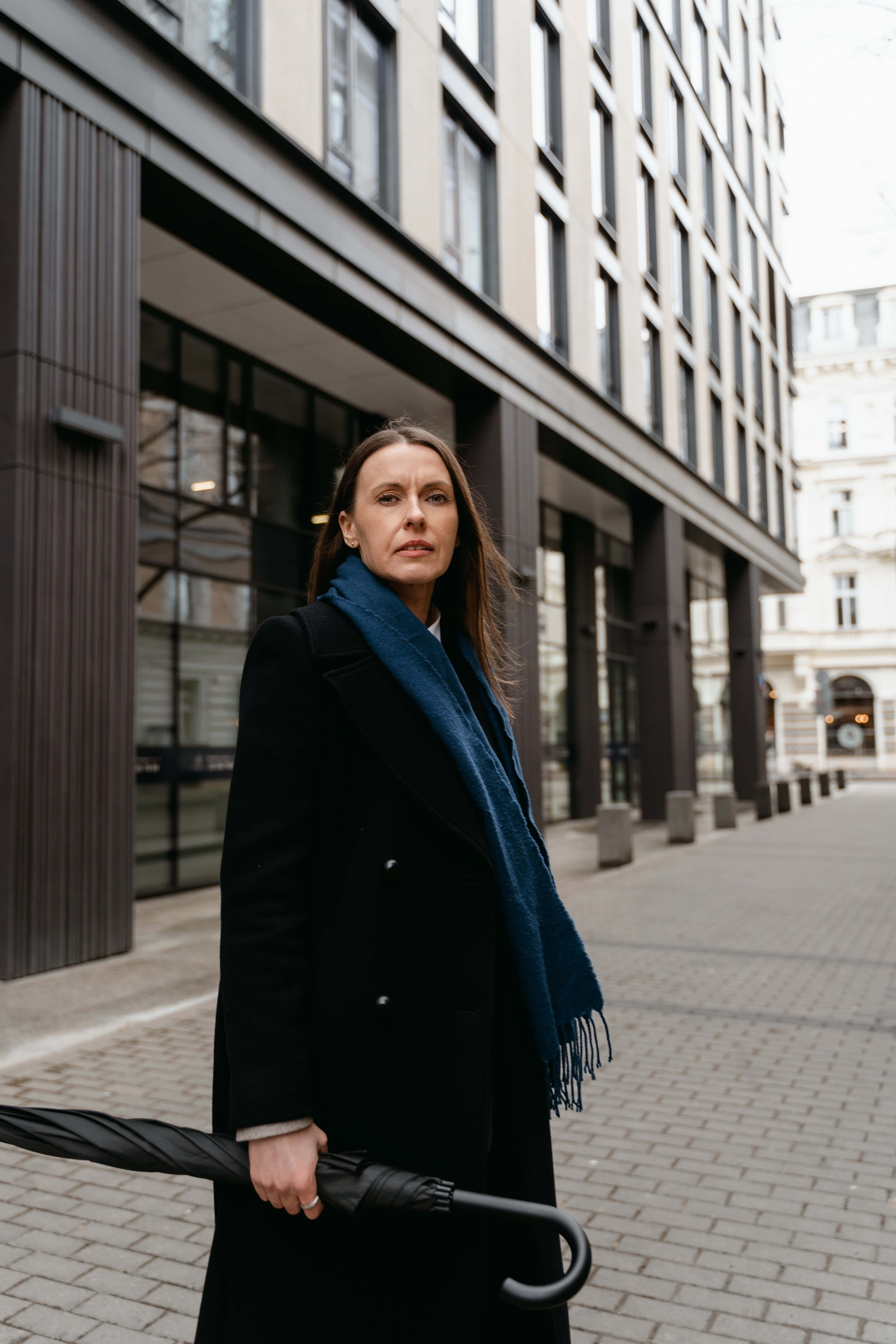 navy blue scarf, black coat, city sidewalk, 5K Phone Wallpaper