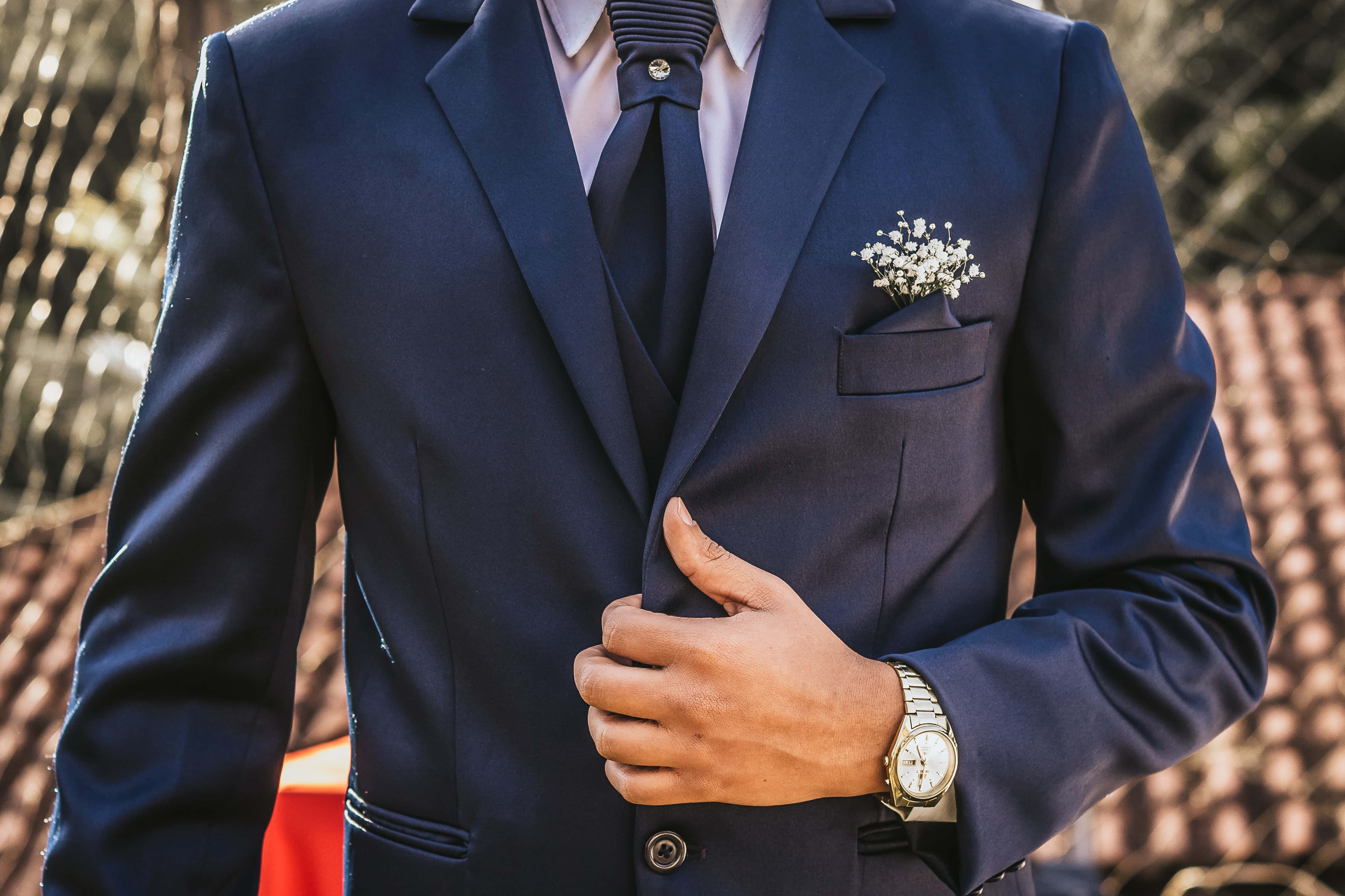 navy suit, white floral boutonniere, silver watch, 4K Desktop Wallpaper