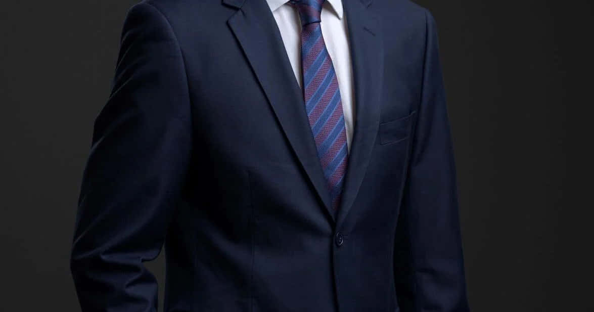 navy blue suit, patterned tie, dark studio background, SD Desktop Wallpaper